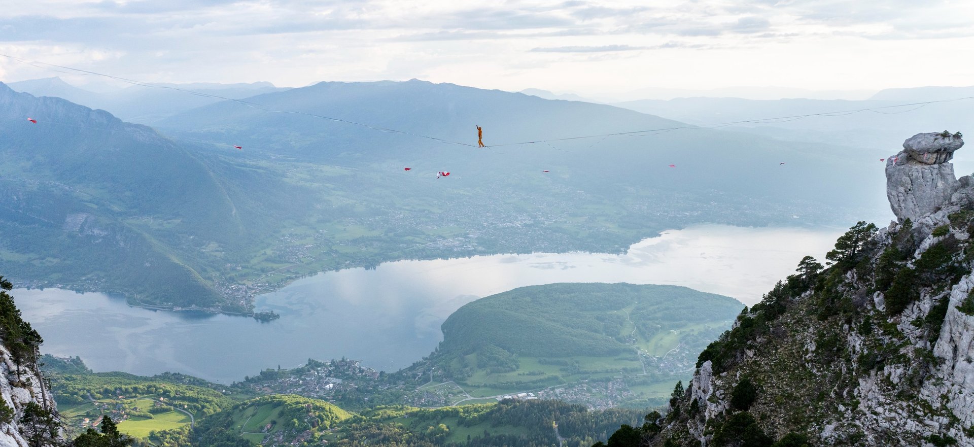 an abstract photo of a curved building with a blue sky in the background
