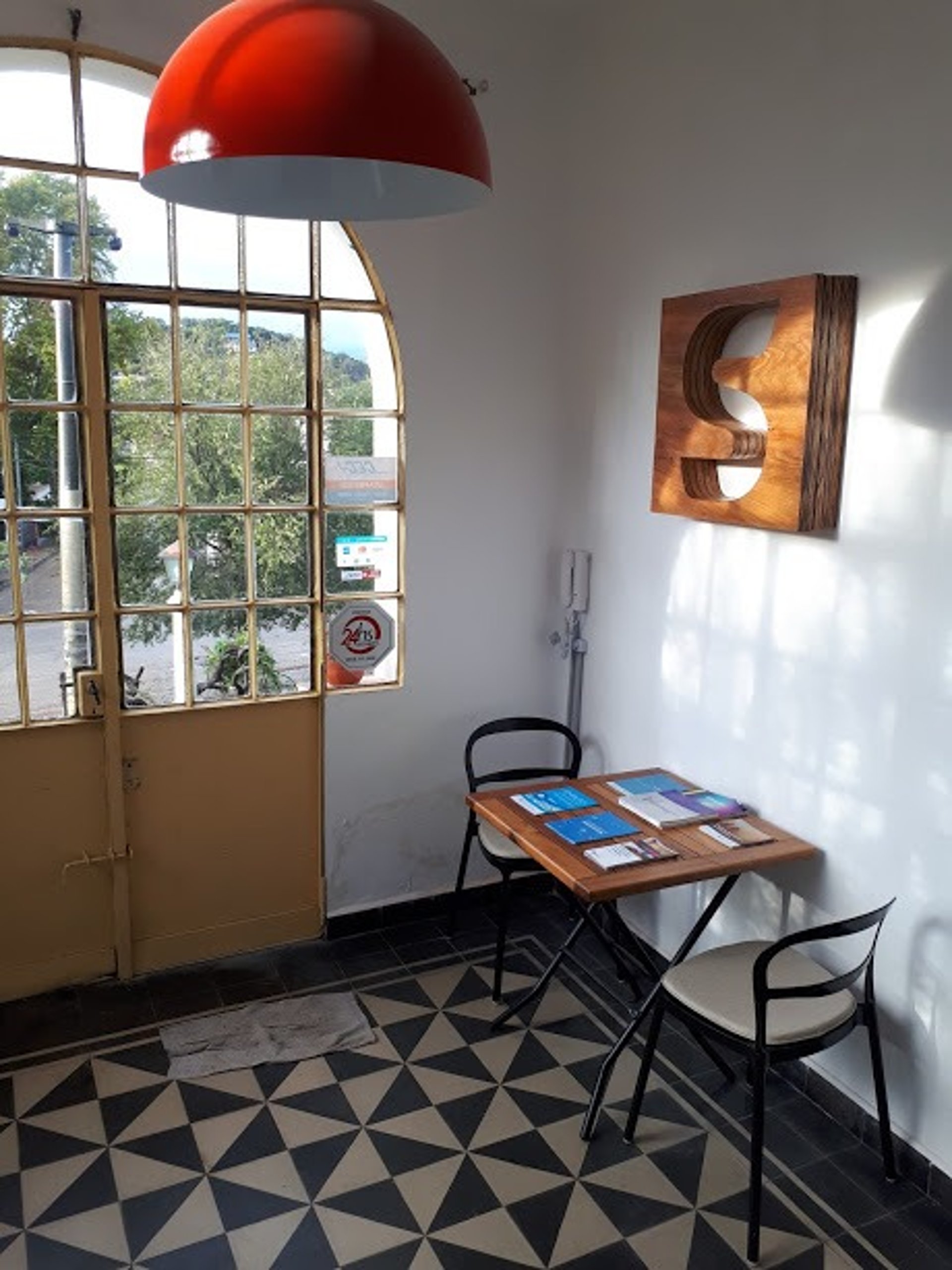 black and brown leather padded tub sofa