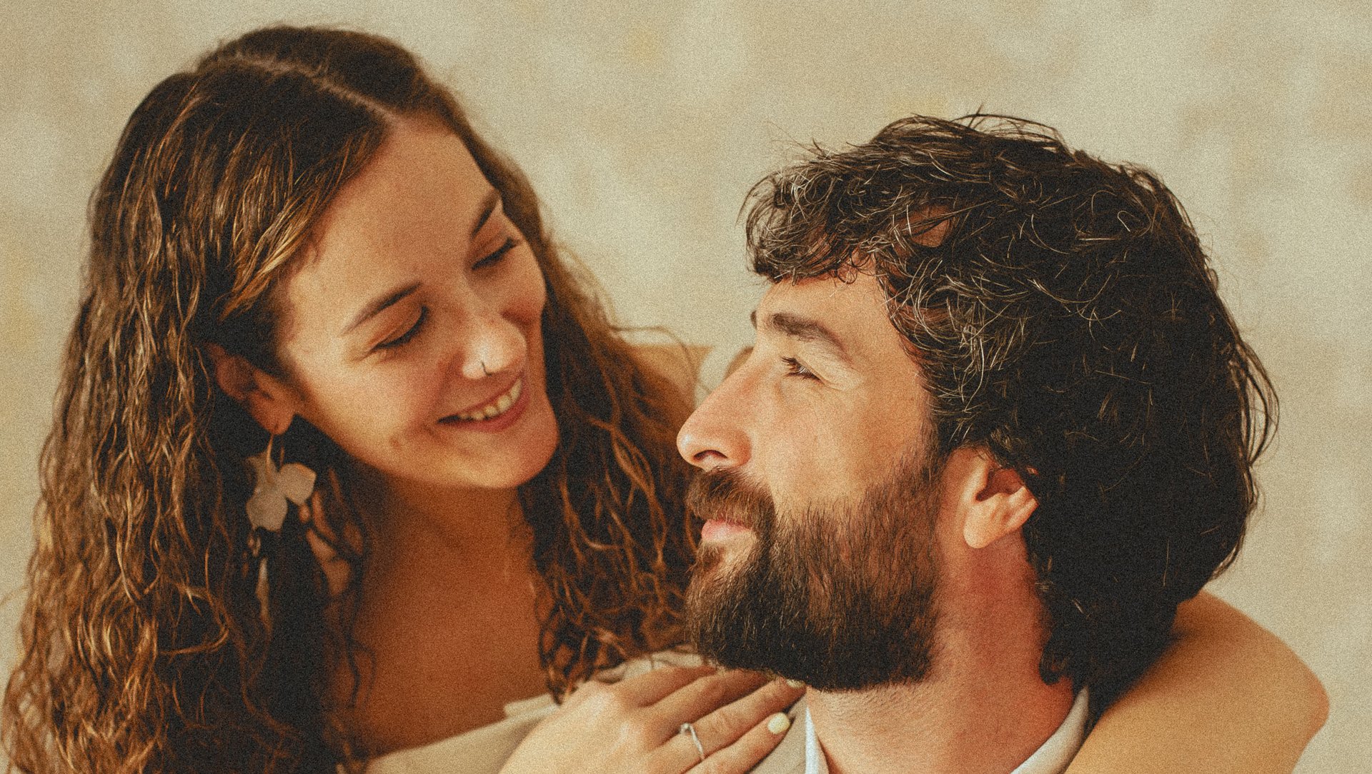 couple wearing silver-colored rings