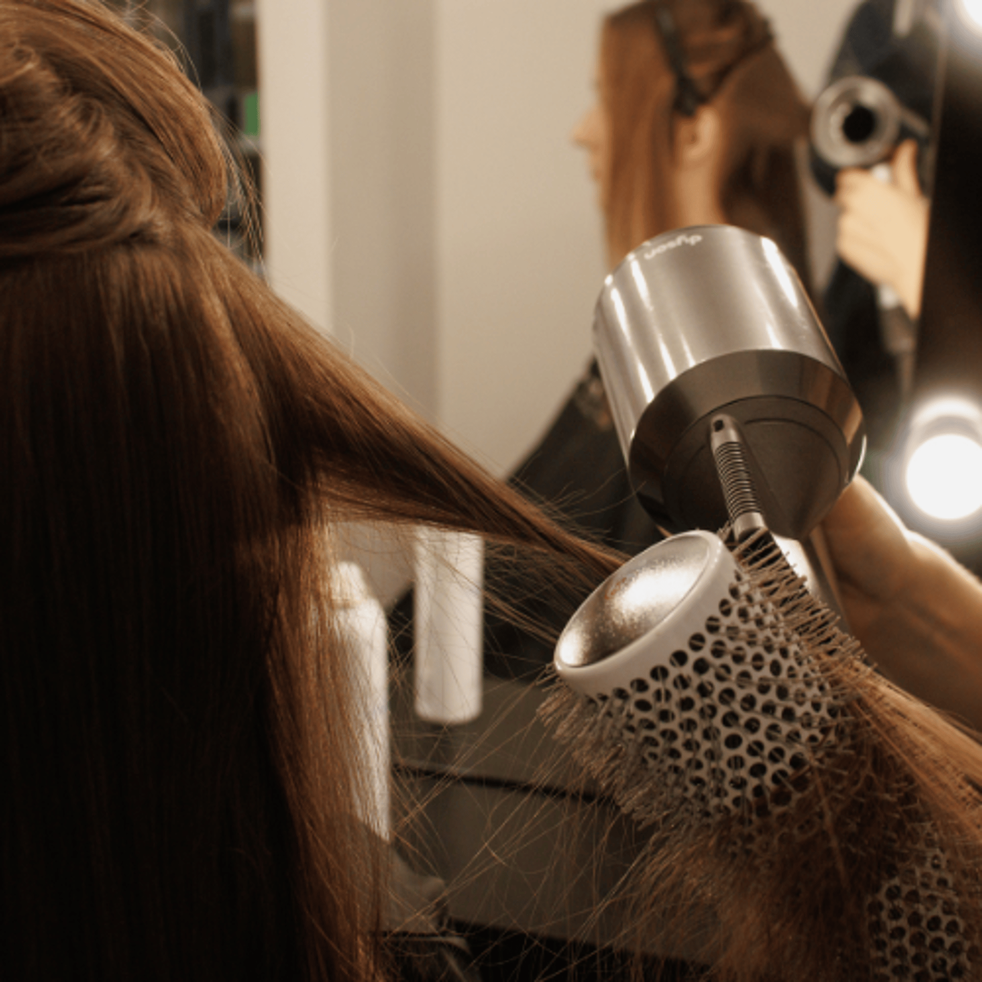 woman wearing yellow long-sleeved dress under white clouds and blue sky during daytime