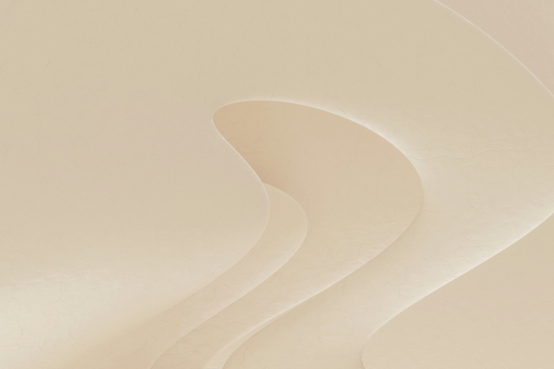 yellow ceramic mug beside gray aluminum iMac