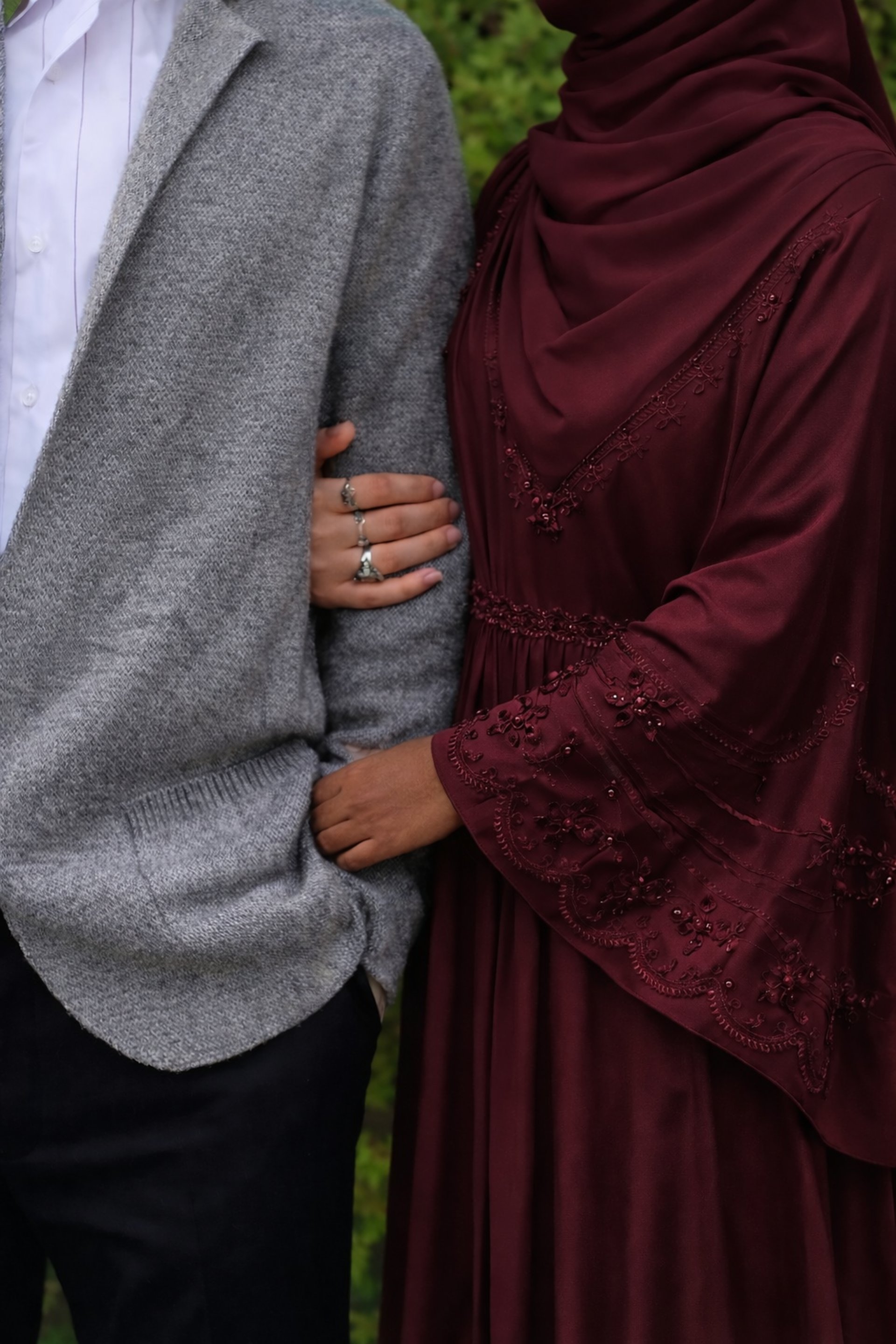 man and woman holding hands