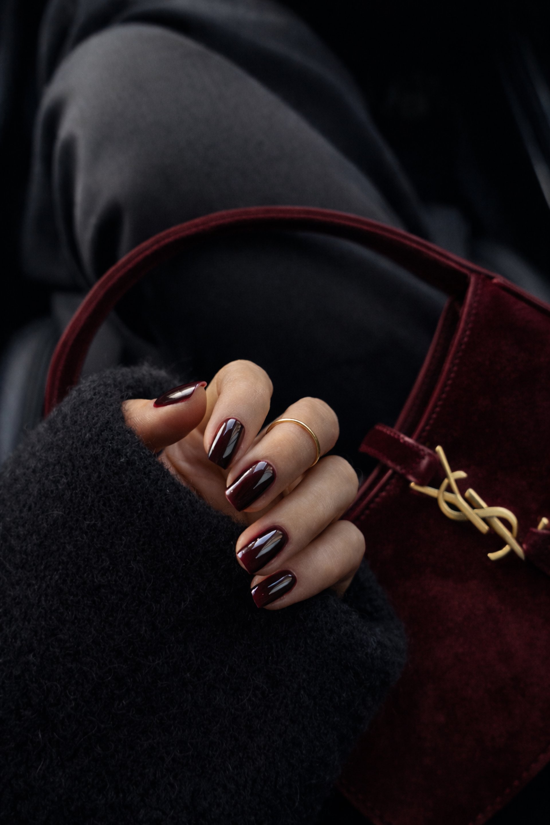 an abstract photo of a curved building with a blue sky in the background