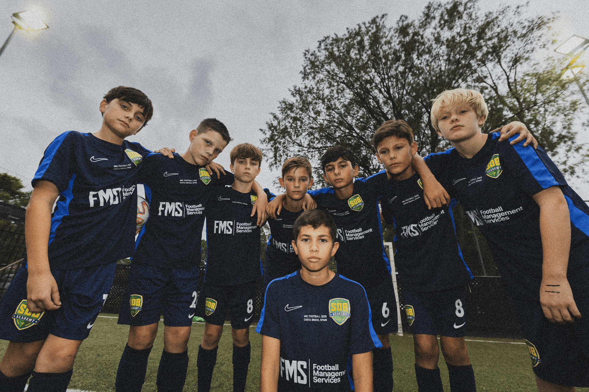 an abstract photo of a curved building with a blue sky in the background