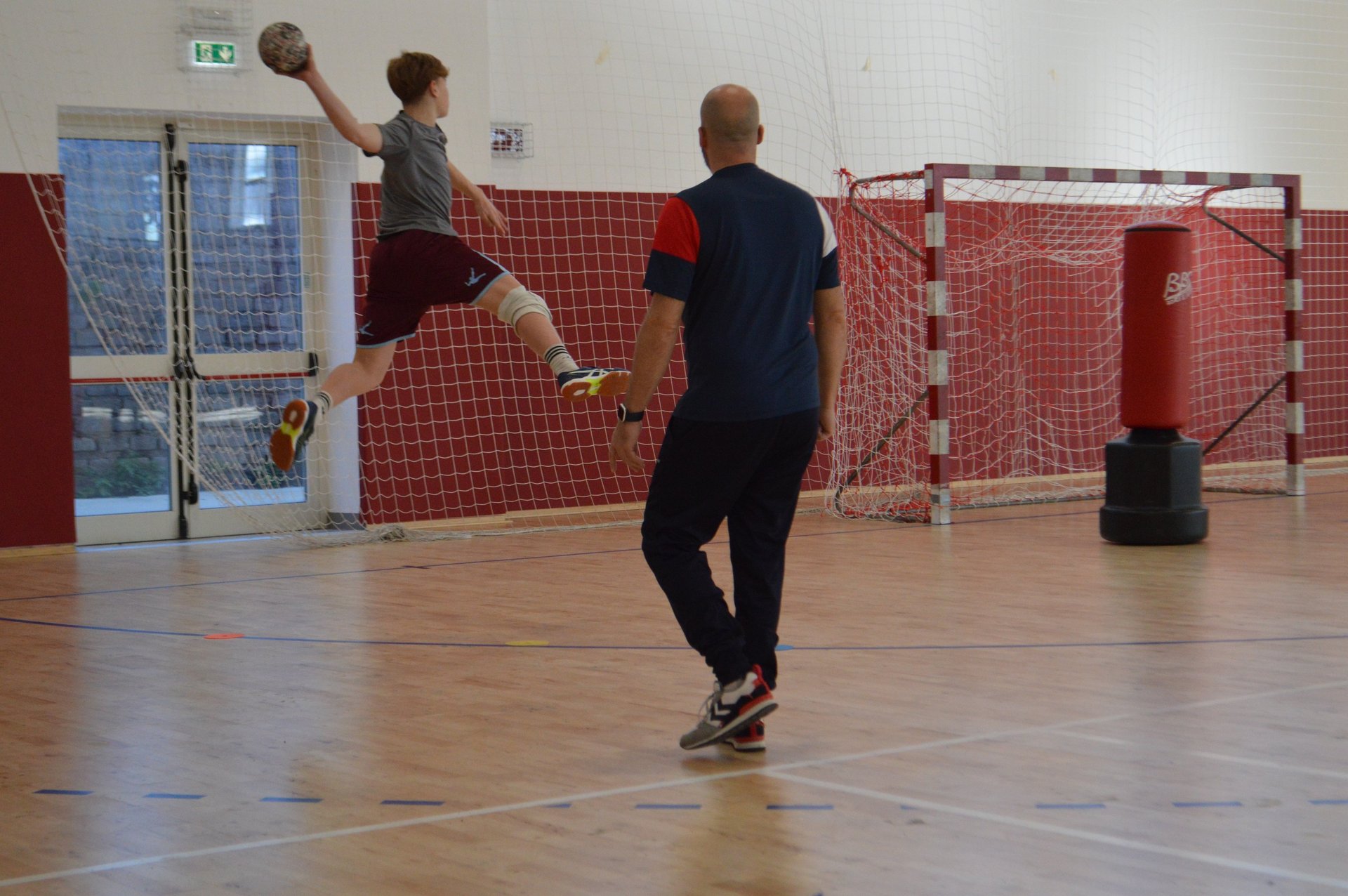 black and brown leather padded tub sofa