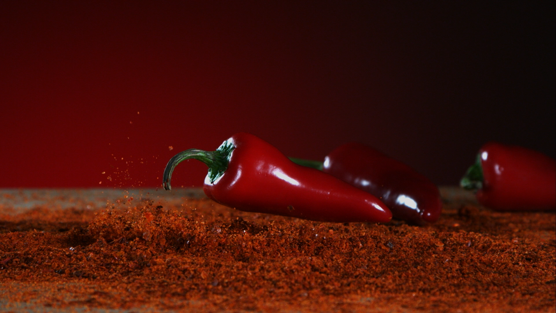 a close up of a black and brown abstract painting