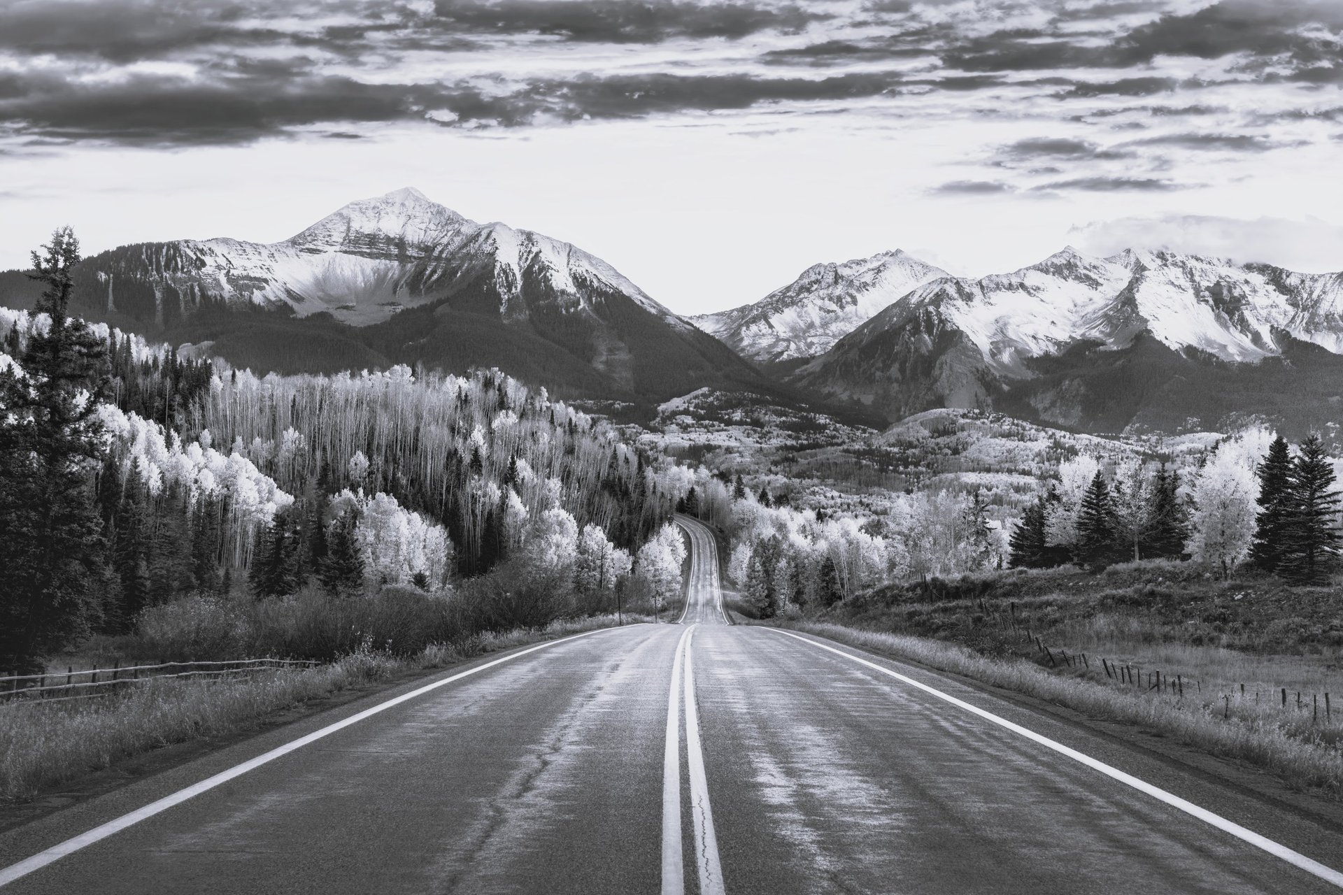 a snow covered mountain with a sky background