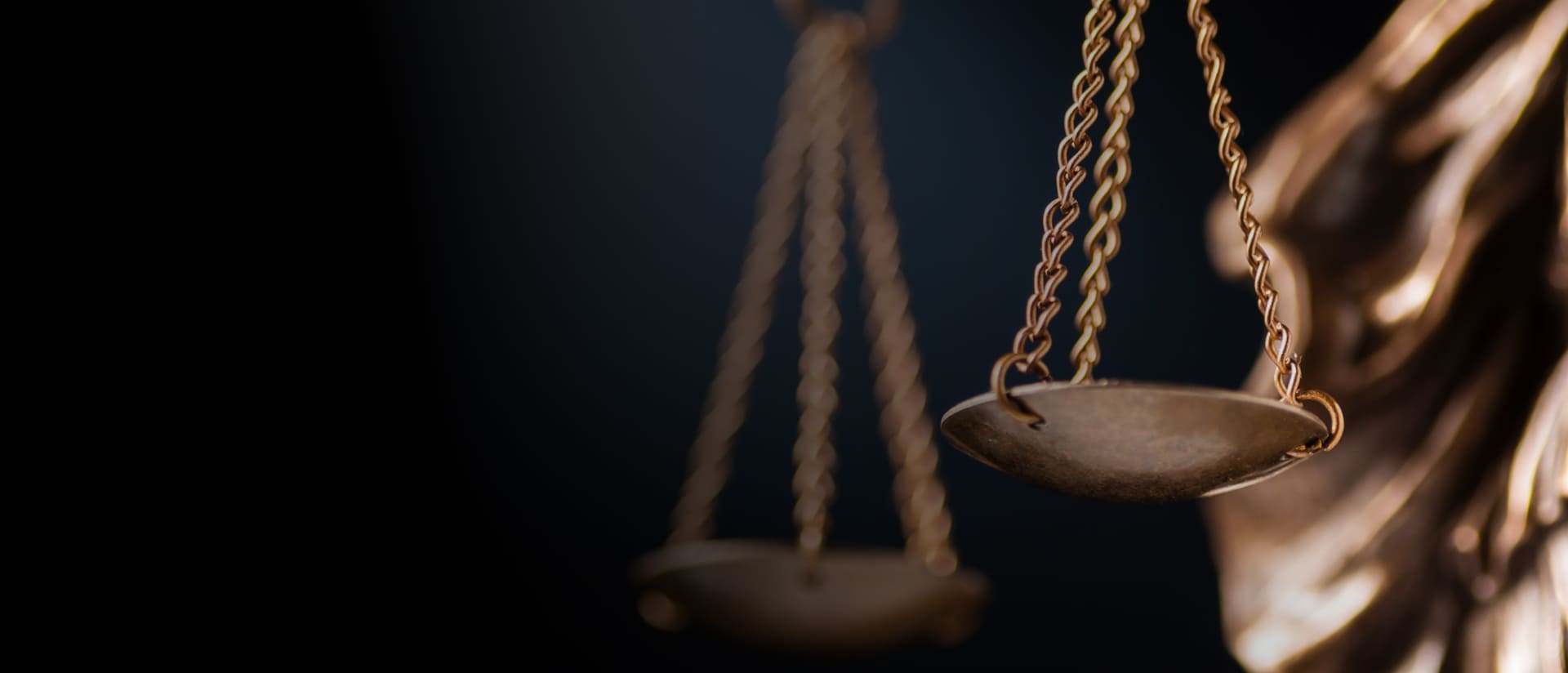 an abstract photo of a curved building with a blue sky in the background