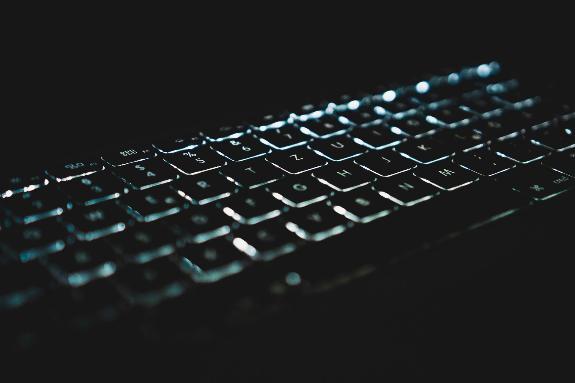 closeup photo of turned-on blue and white laptop computer