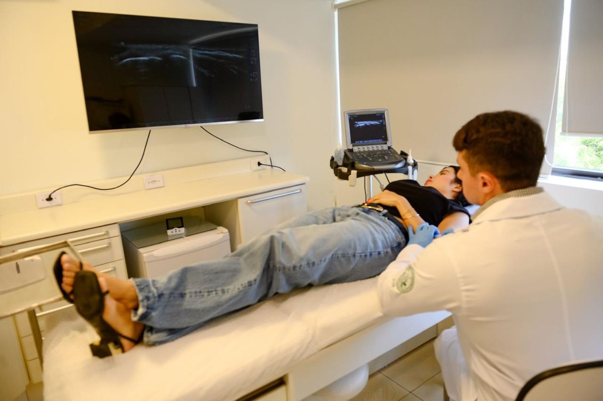 woman wearing yellow long-sleeved dress under white clouds and blue sky during daytime