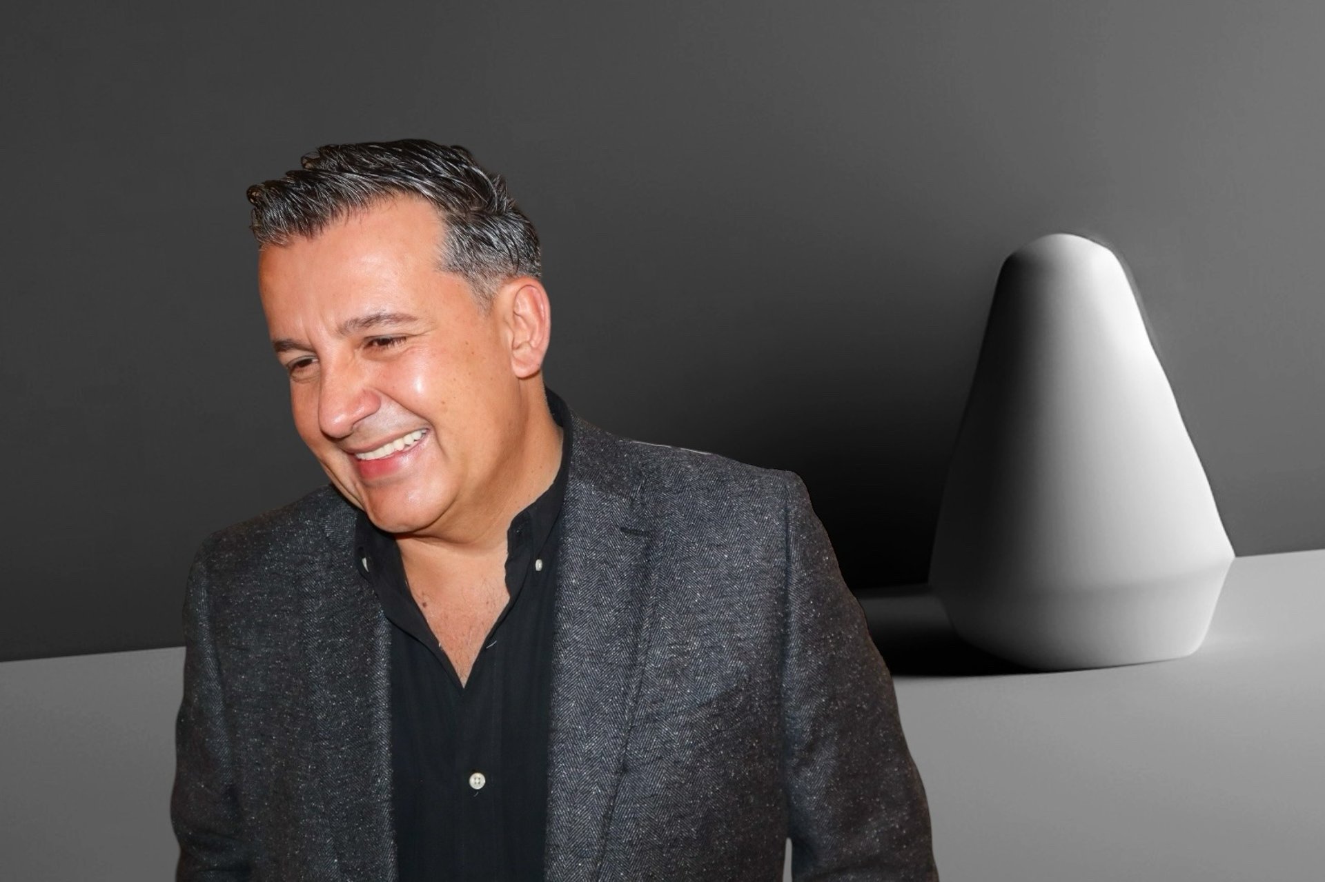 black and brown leather padded tub sofa