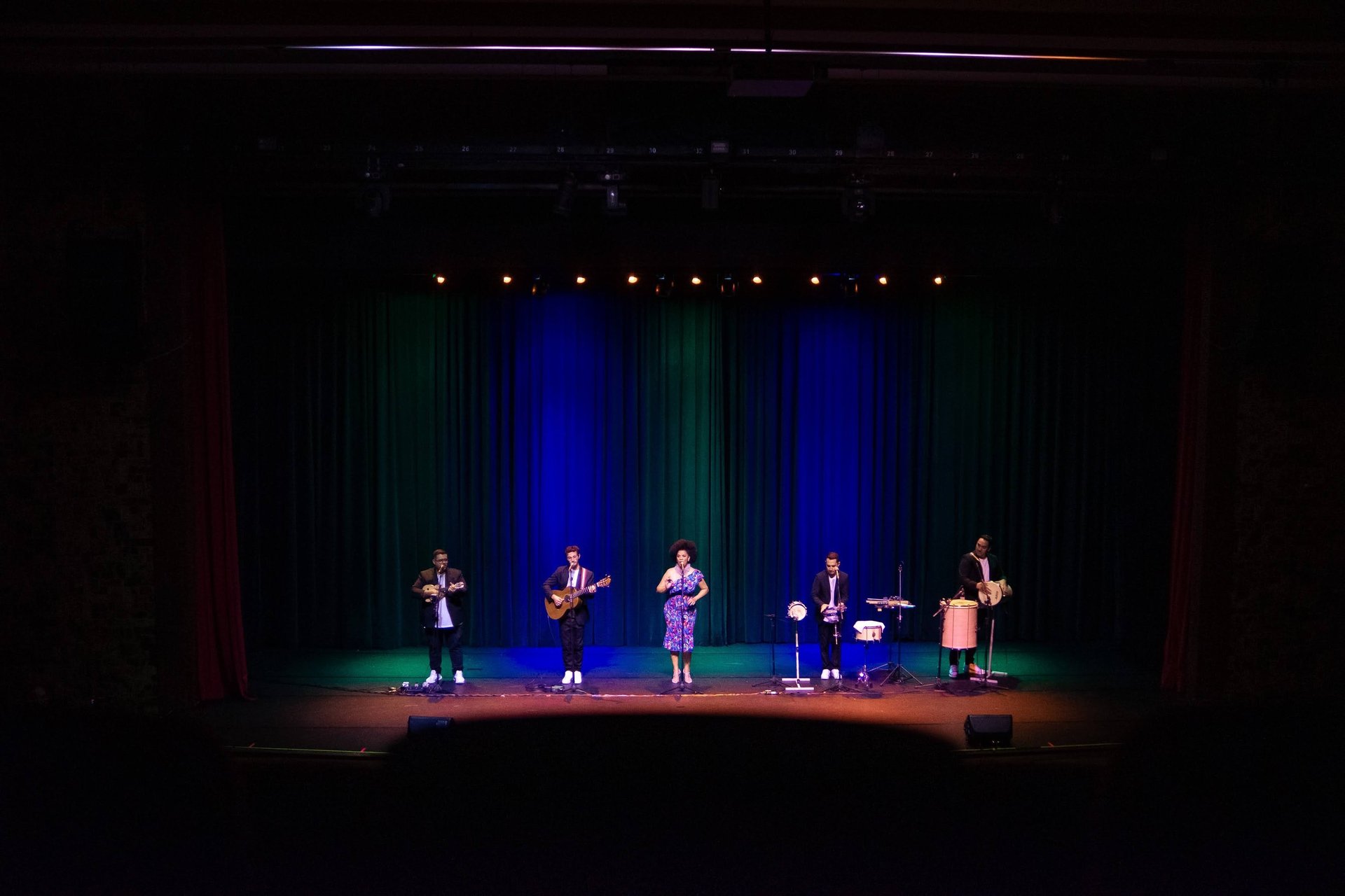 woman wearing yellow long-sleeved dress under white clouds and blue sky during daytime