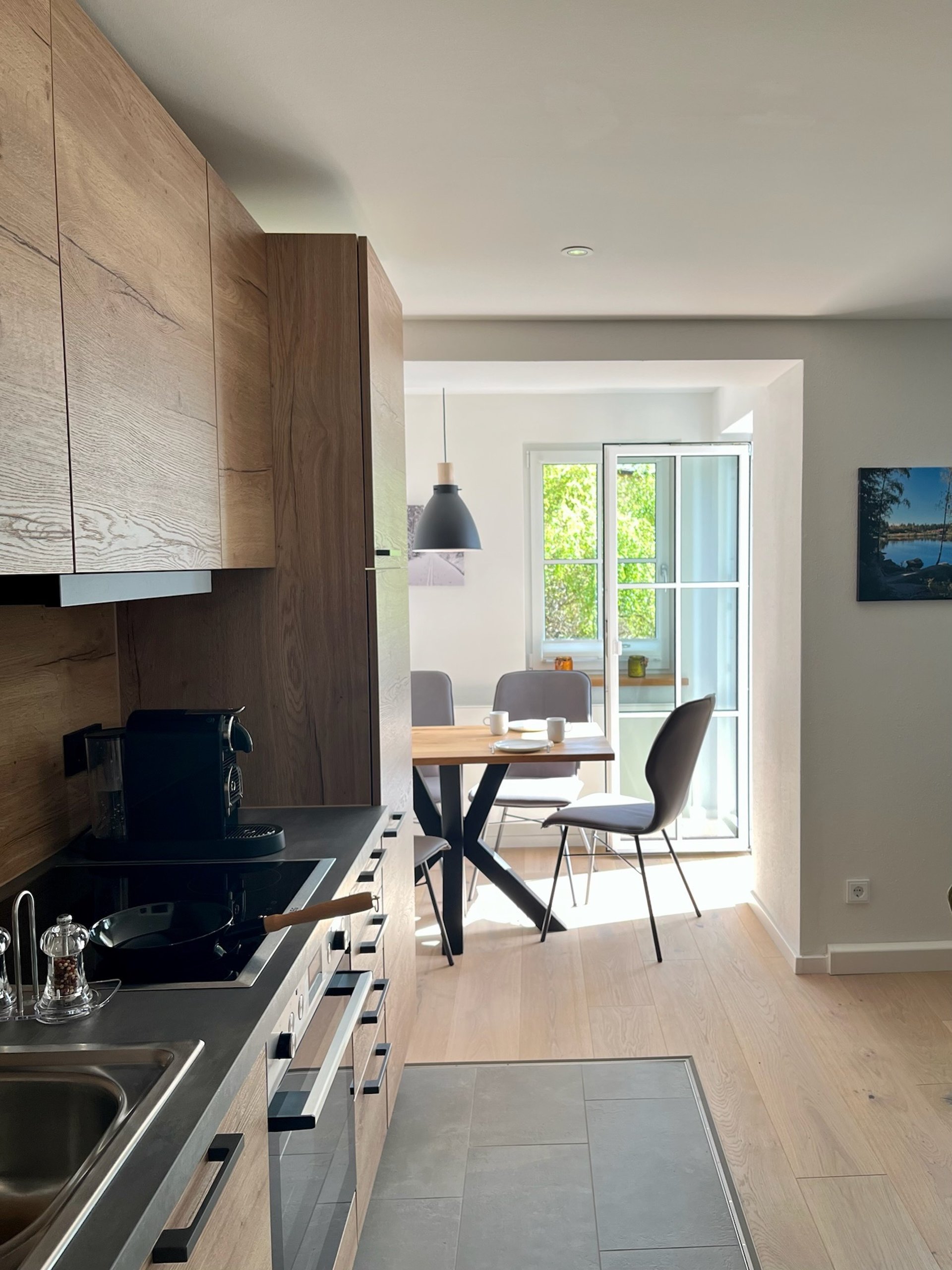 black and brown leather padded tub sofa
