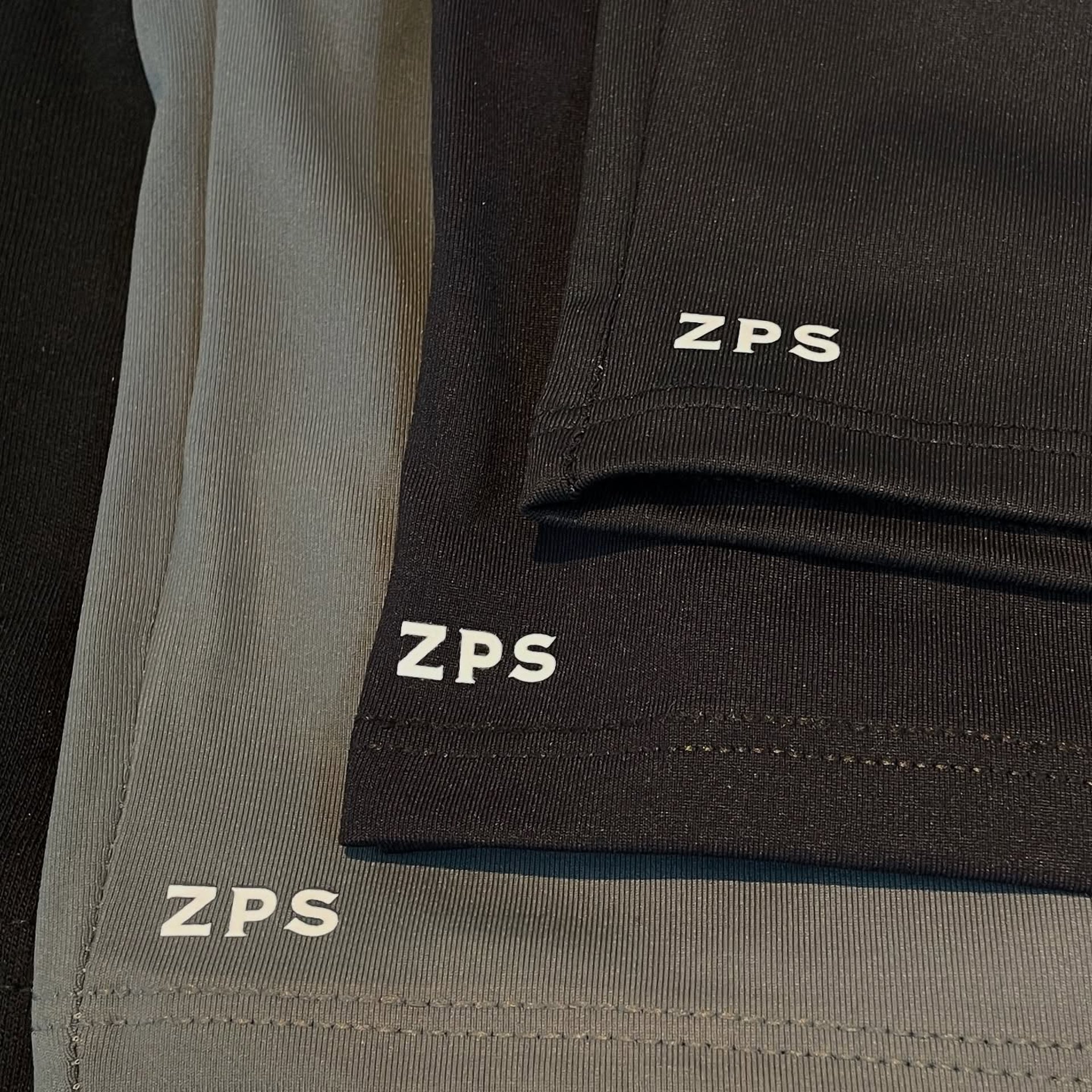 person wearing grey knit sweater