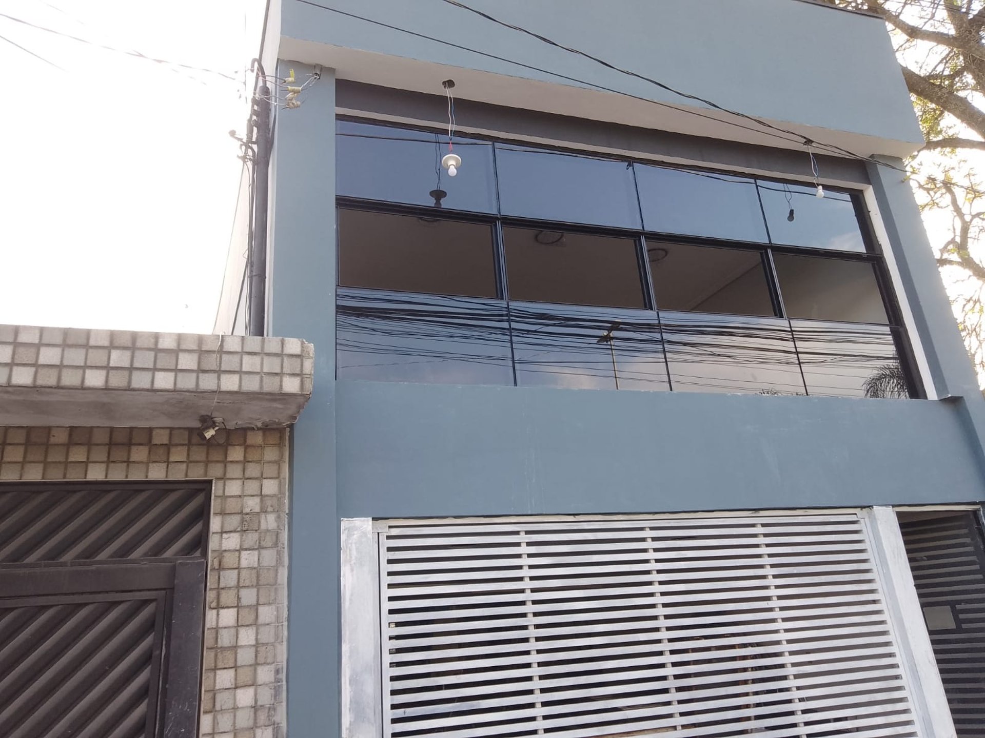 woman wearing yellow long-sleeved dress under white clouds and blue sky during daytime