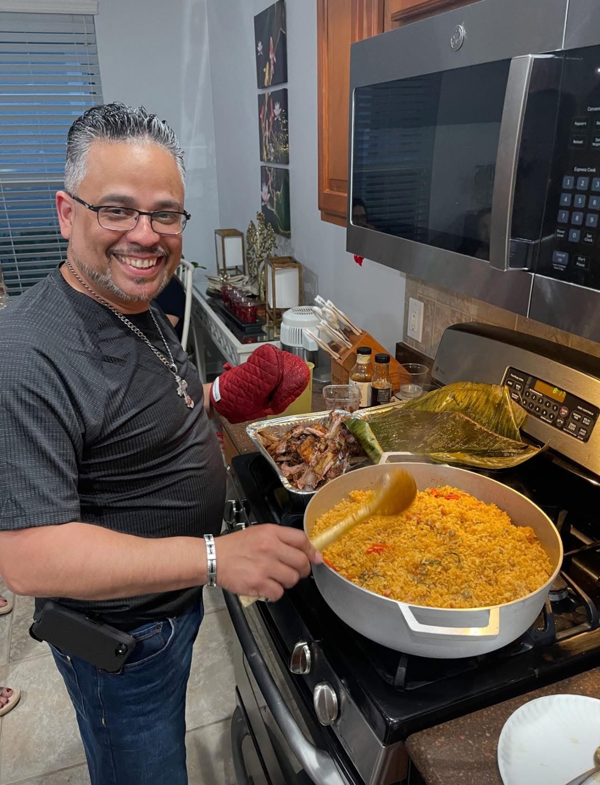 a man cooking arroz con gandules