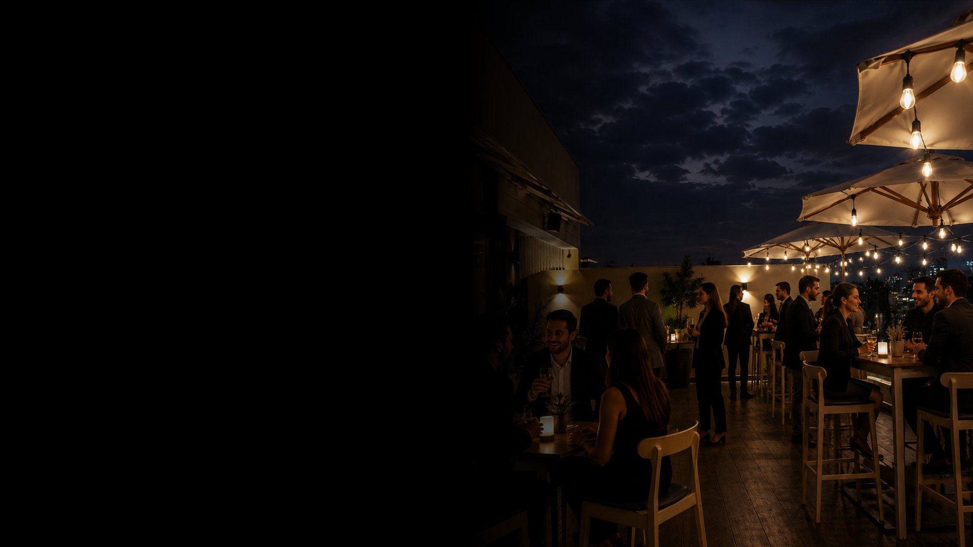 a group of people standing under a canopy at night