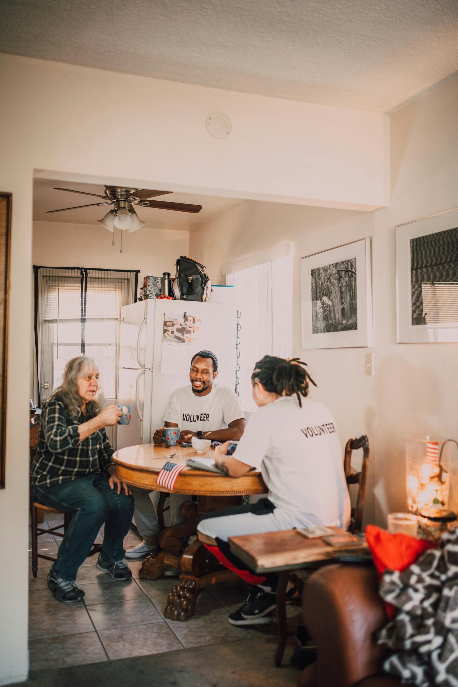 woman wearing yellow long-sleeved dress under white clouds and blue sky during daytime