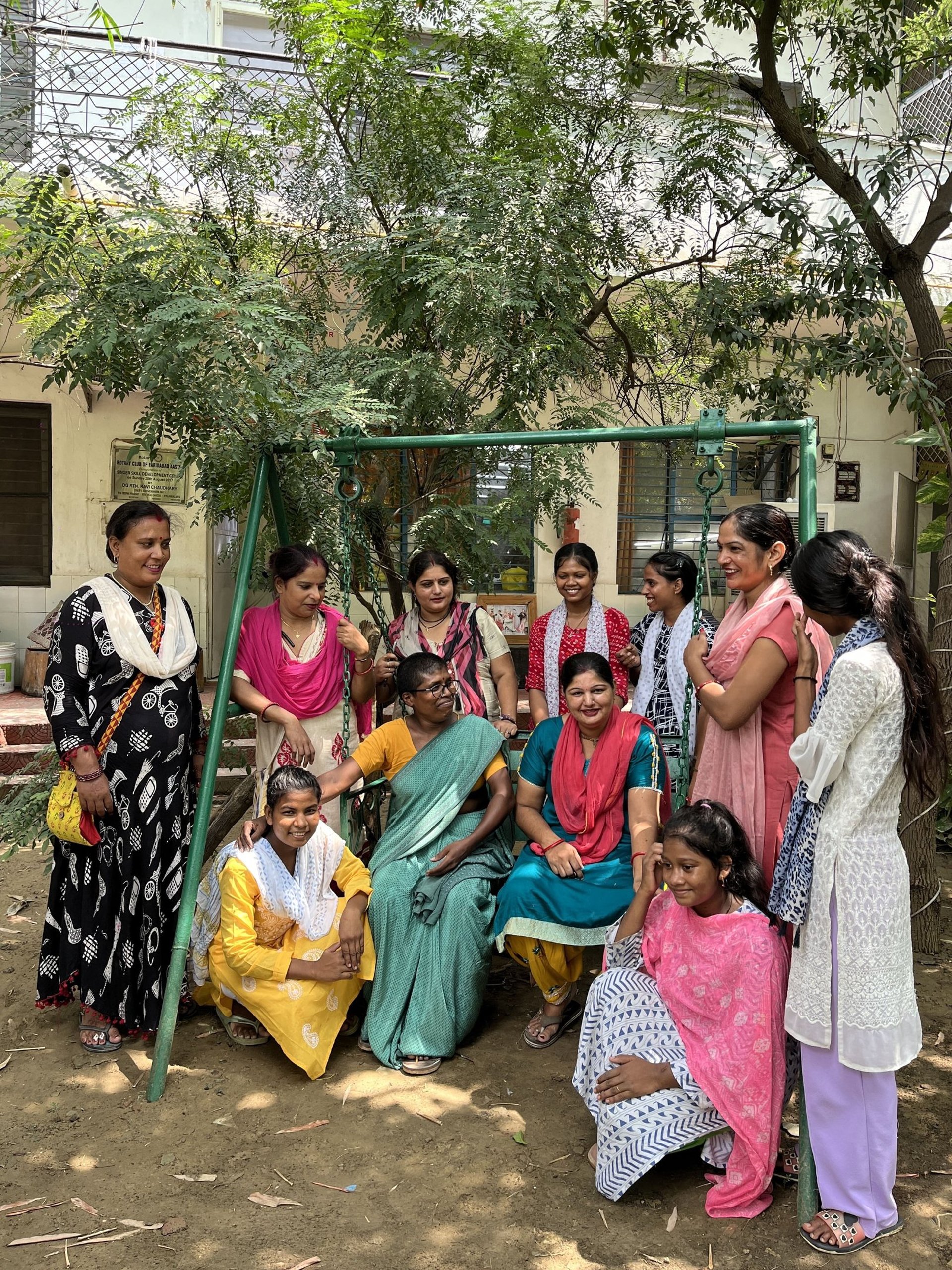 an abstract photo of a curved building with a blue sky in the background