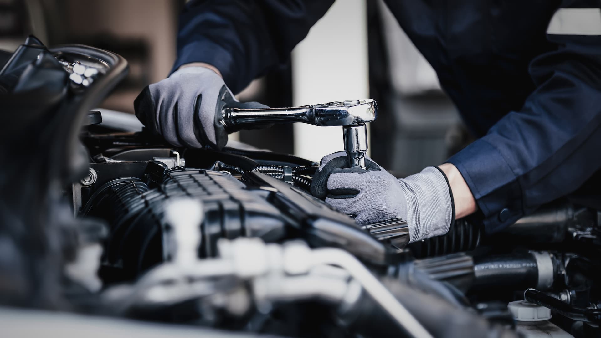a close up of a car engine with its hood up
