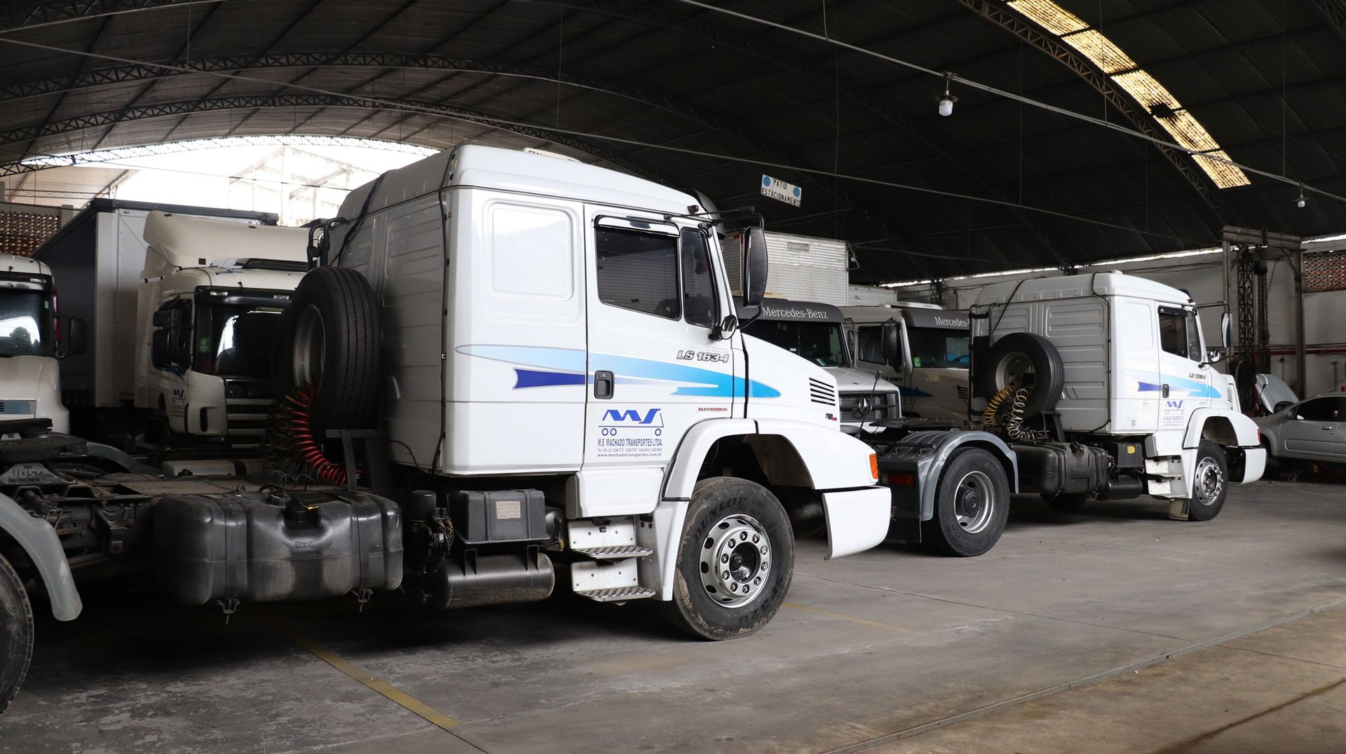 black and brown leather padded tub sofa