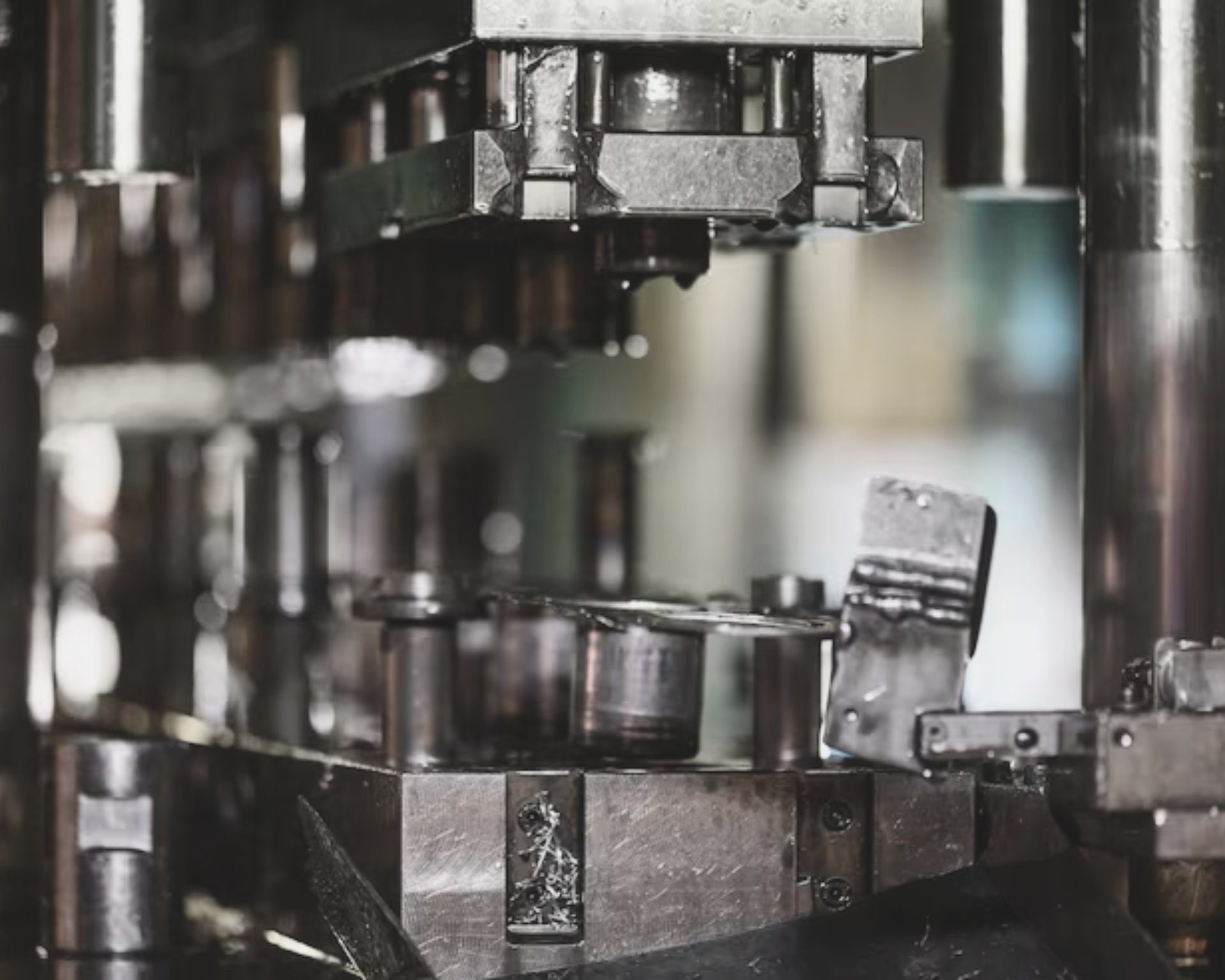 an abstract photo of a curved building with a blue sky in the background