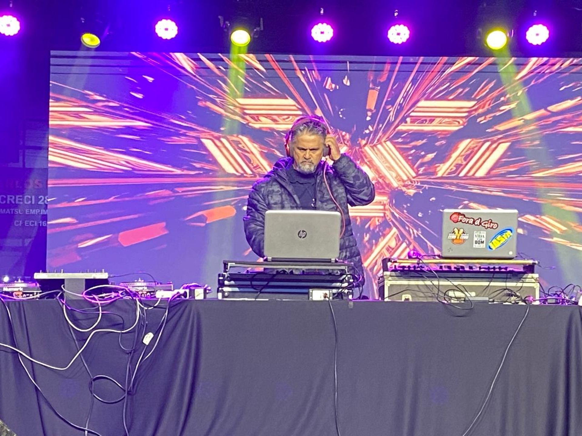 an abstract photo of a curved building with a blue sky in the background