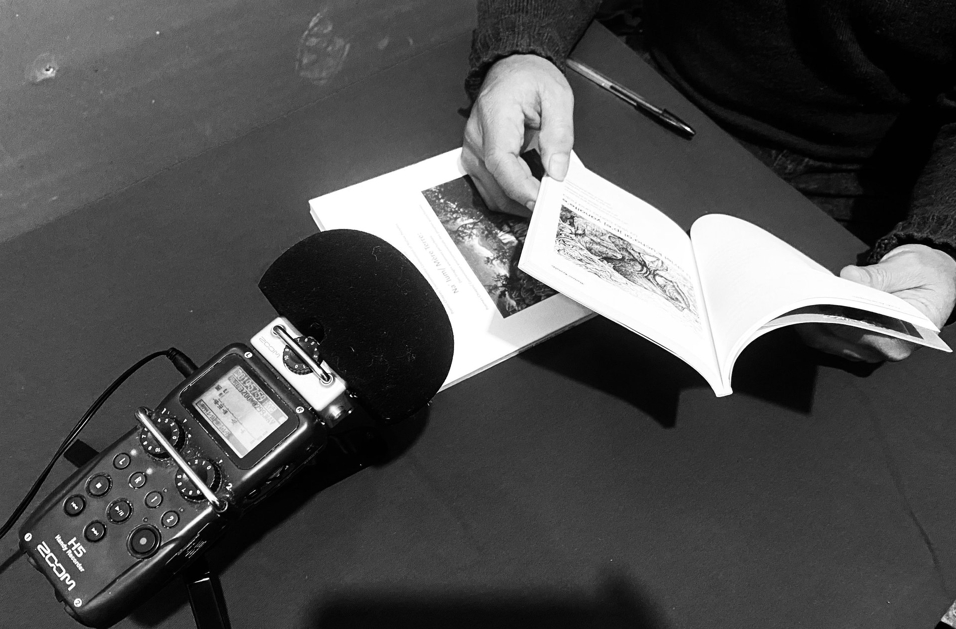 an abstract photo of a curved building with a blue sky in the background
