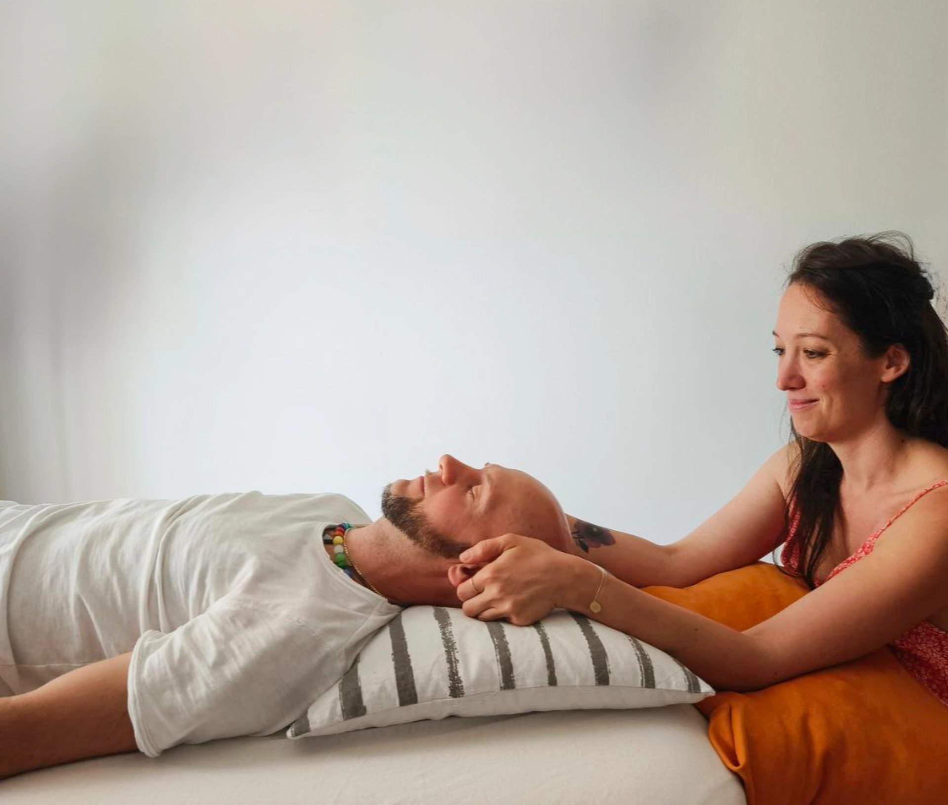 white and green flower on white surface