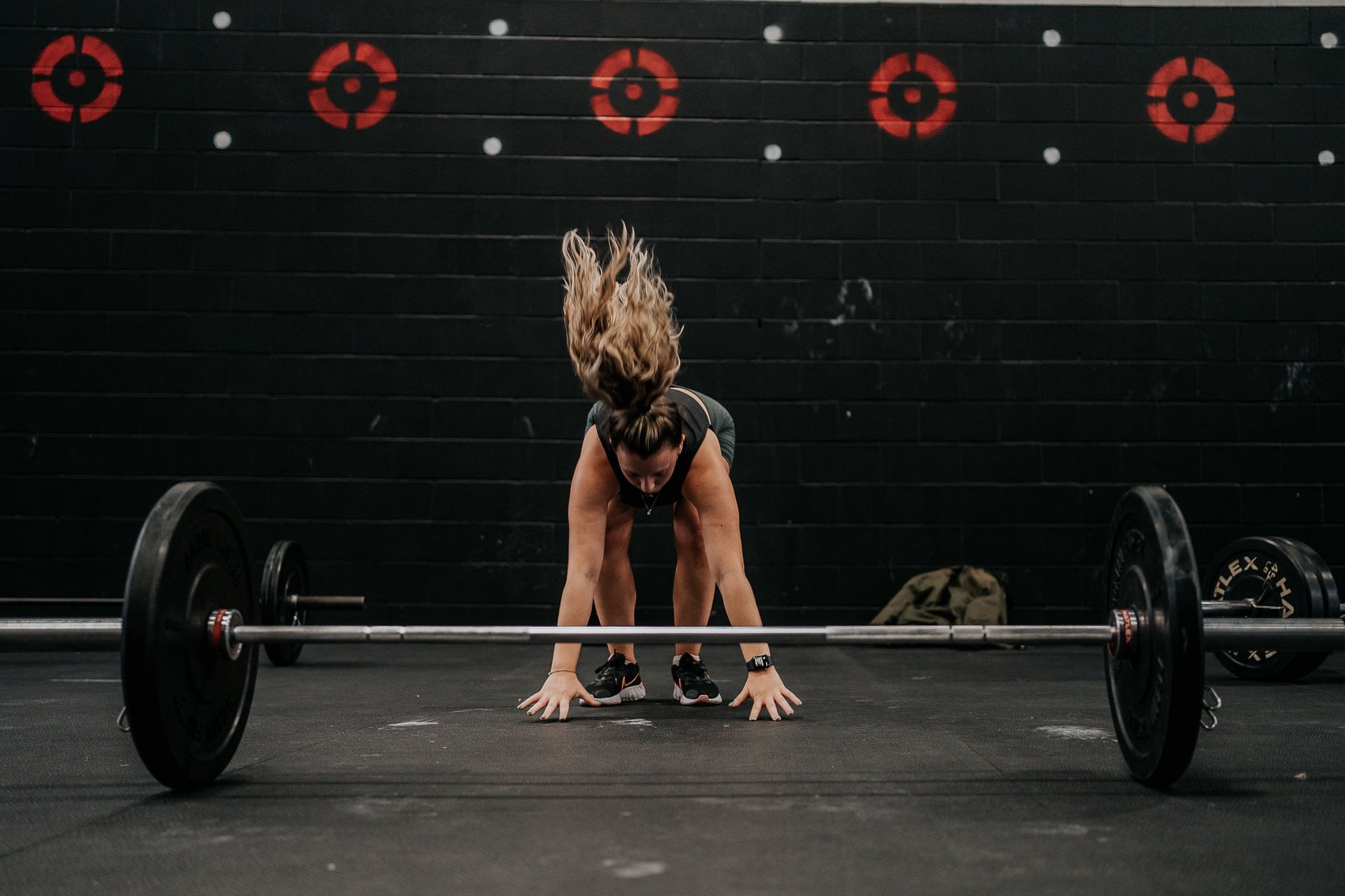 a close up of a person holding a doughnut