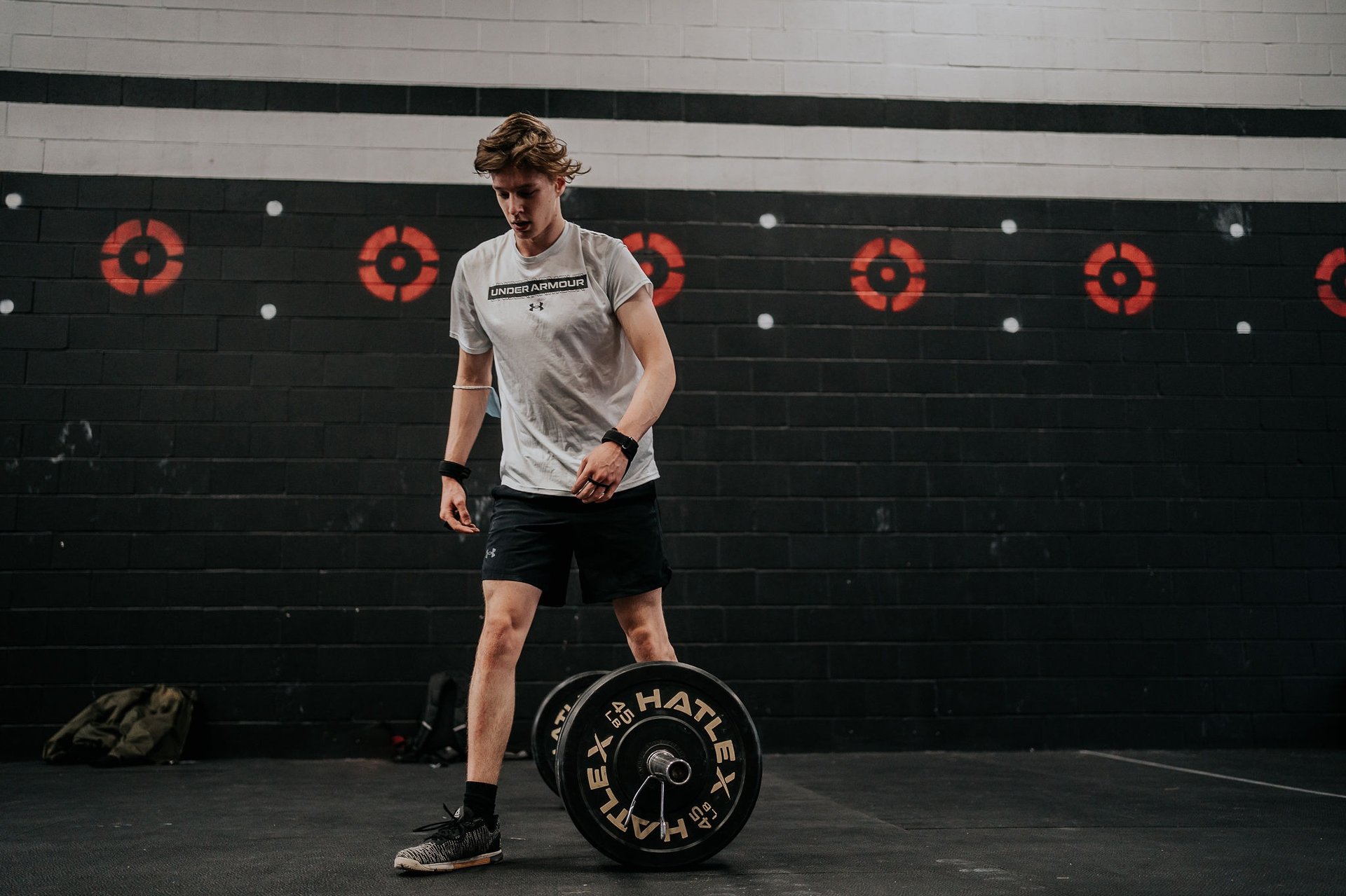 a close up of a person holding a doughnut