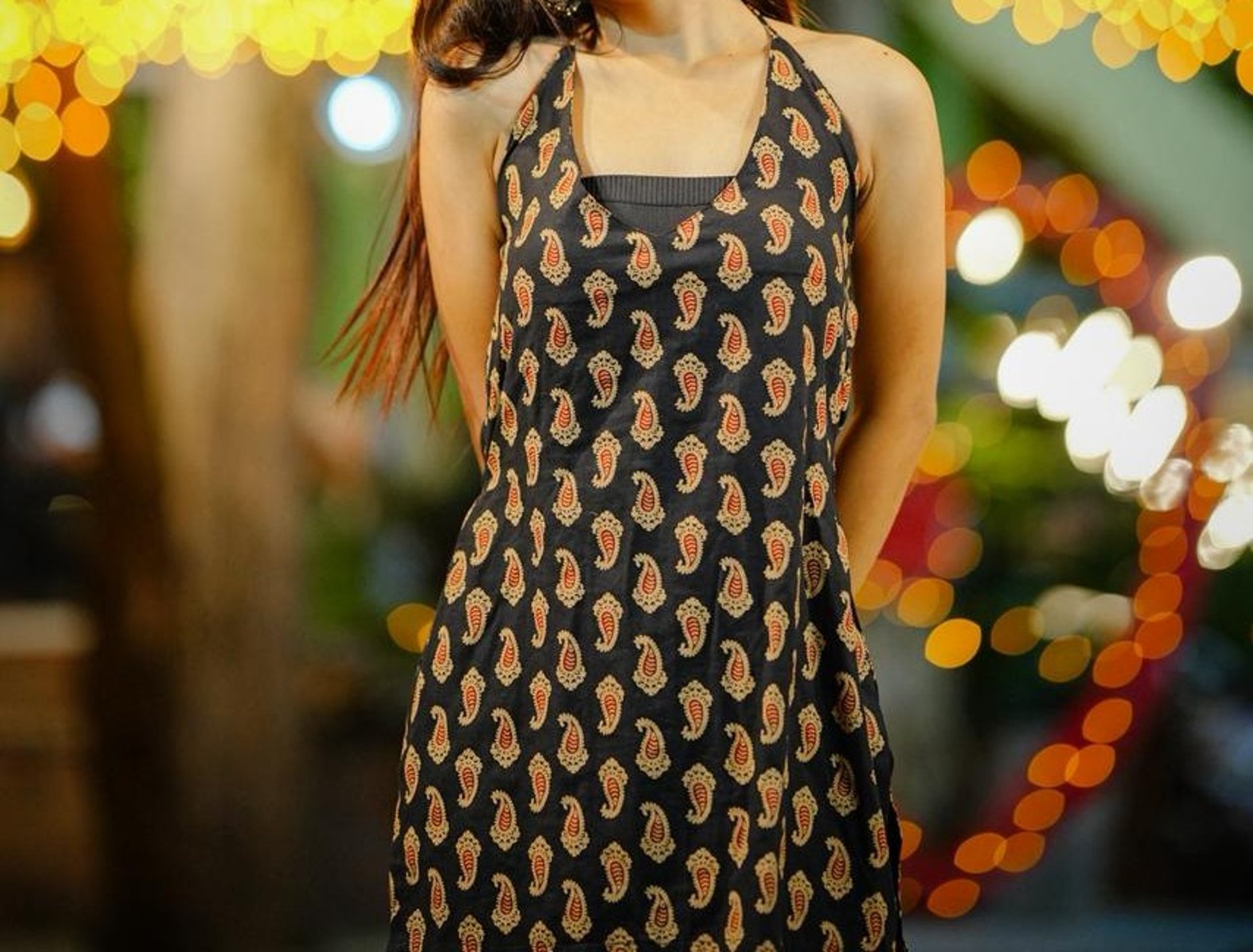 person wearing grey knit sweater