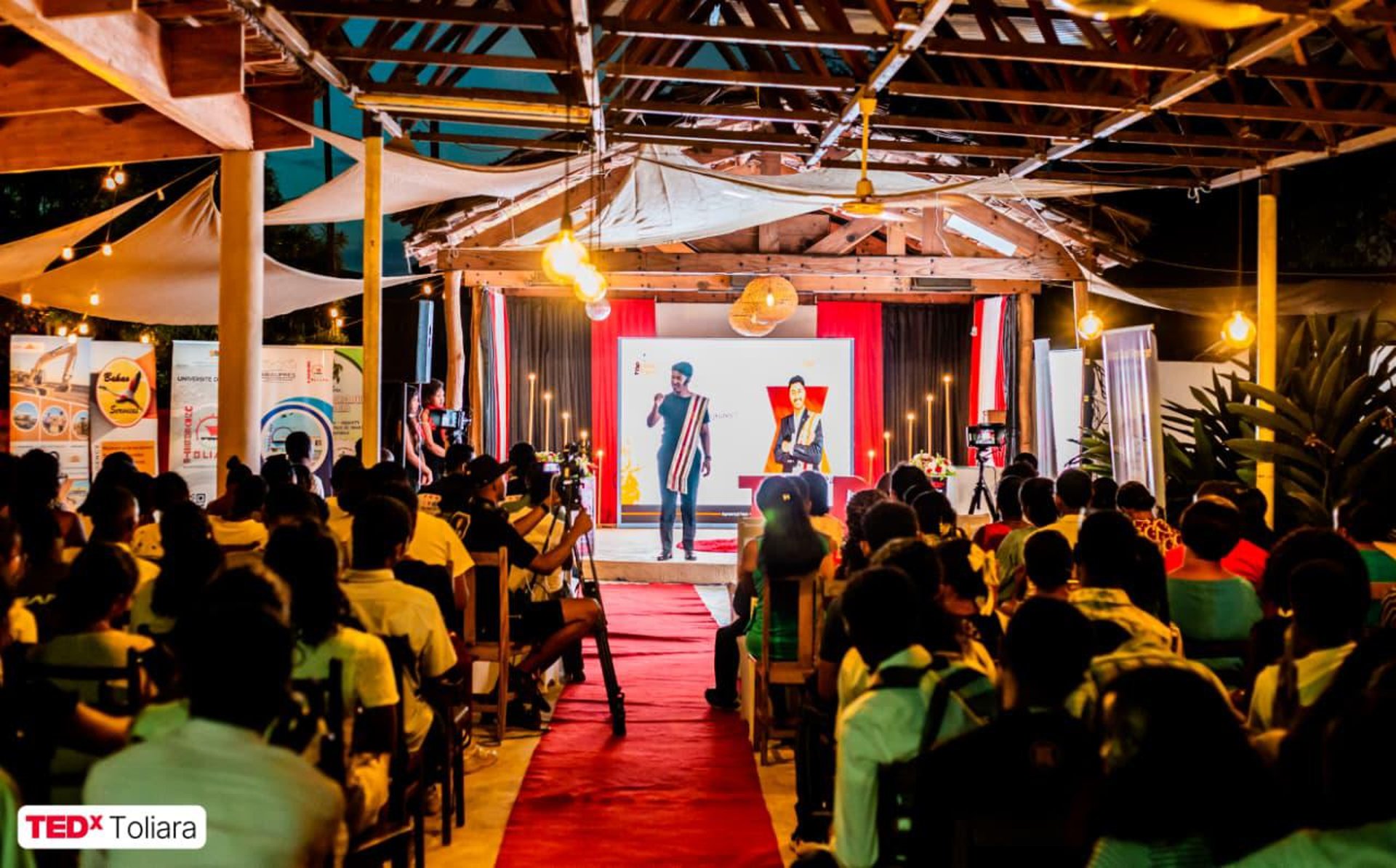 an abstract photo of a curved building with a blue sky in the background