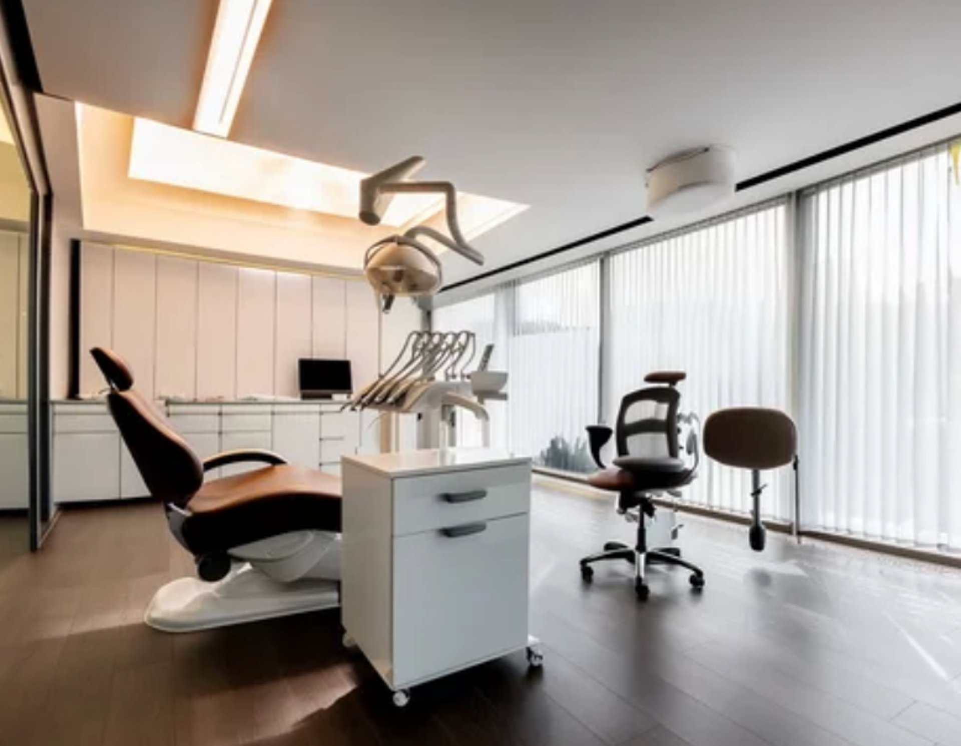 black and brown leather padded tub sofa