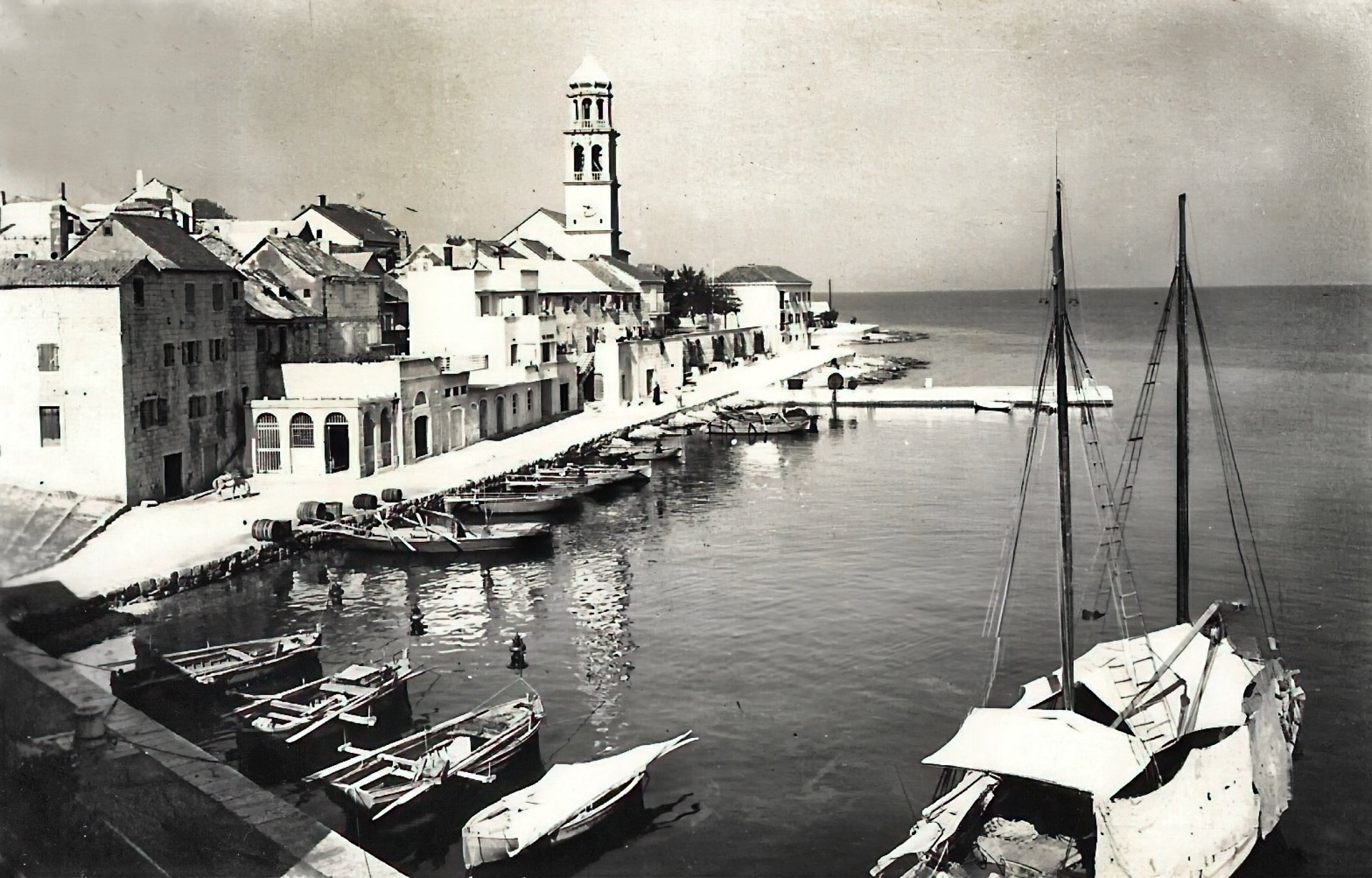an abstract photo of a curved building with a blue sky in the background