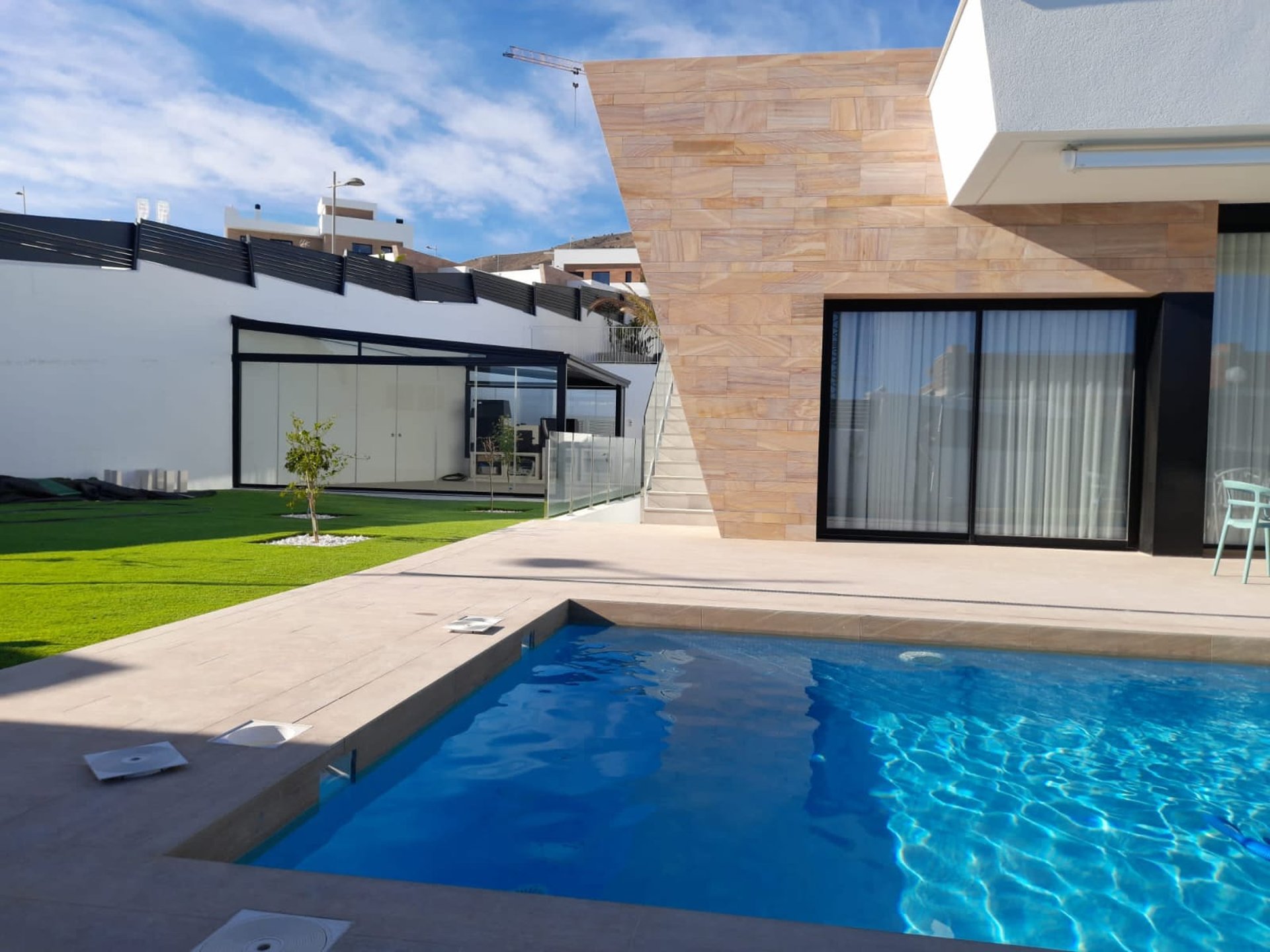 black and brown leather padded tub sofa