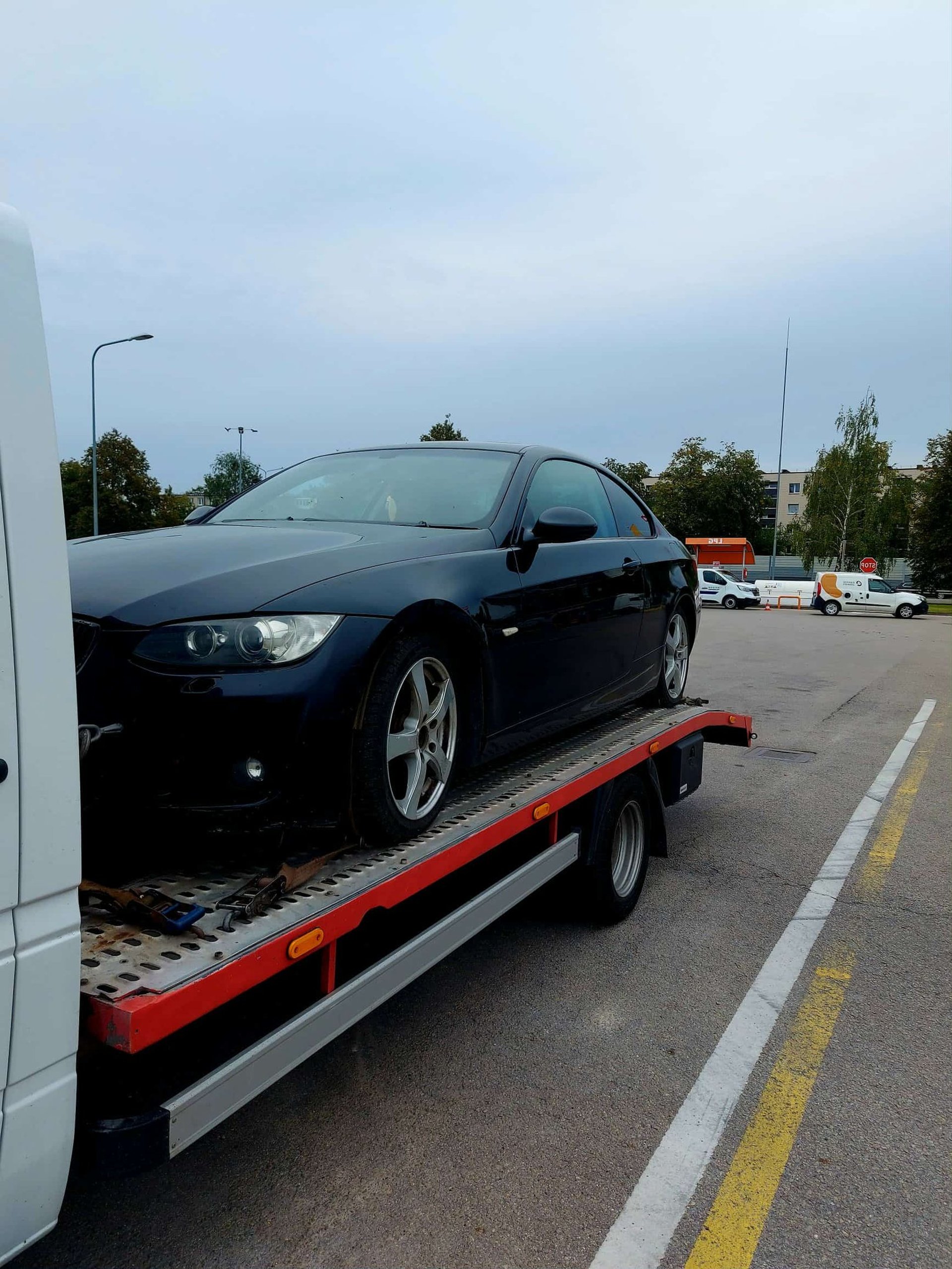 black and brown leather padded tub sofa