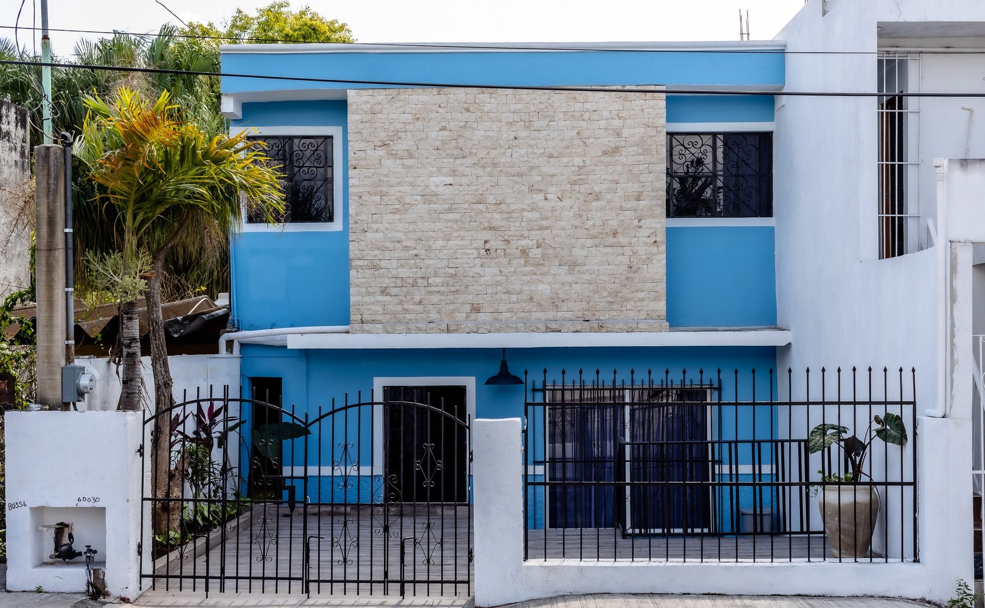 black and brown leather padded tub sofa