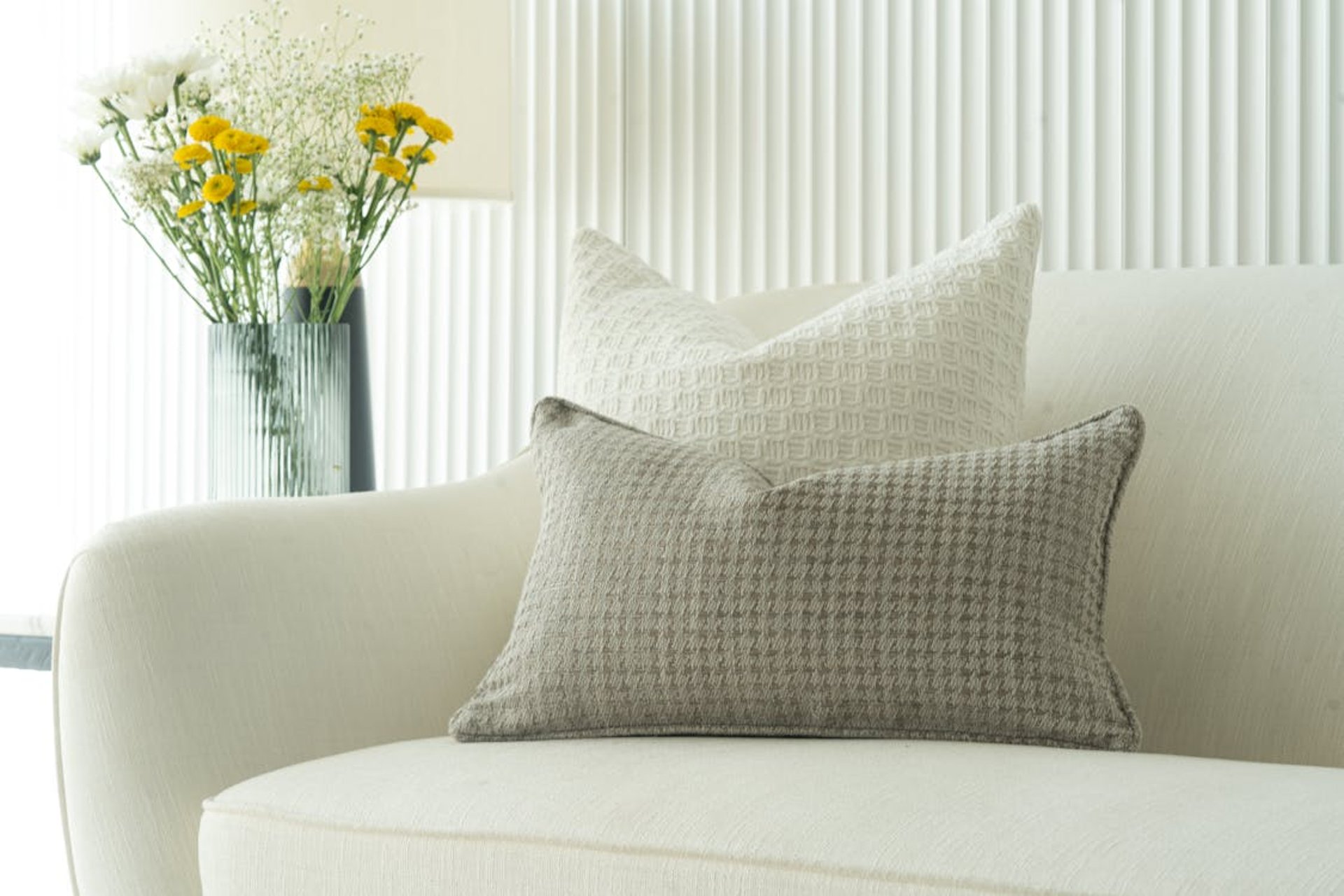 a woman is sitting on a red couch