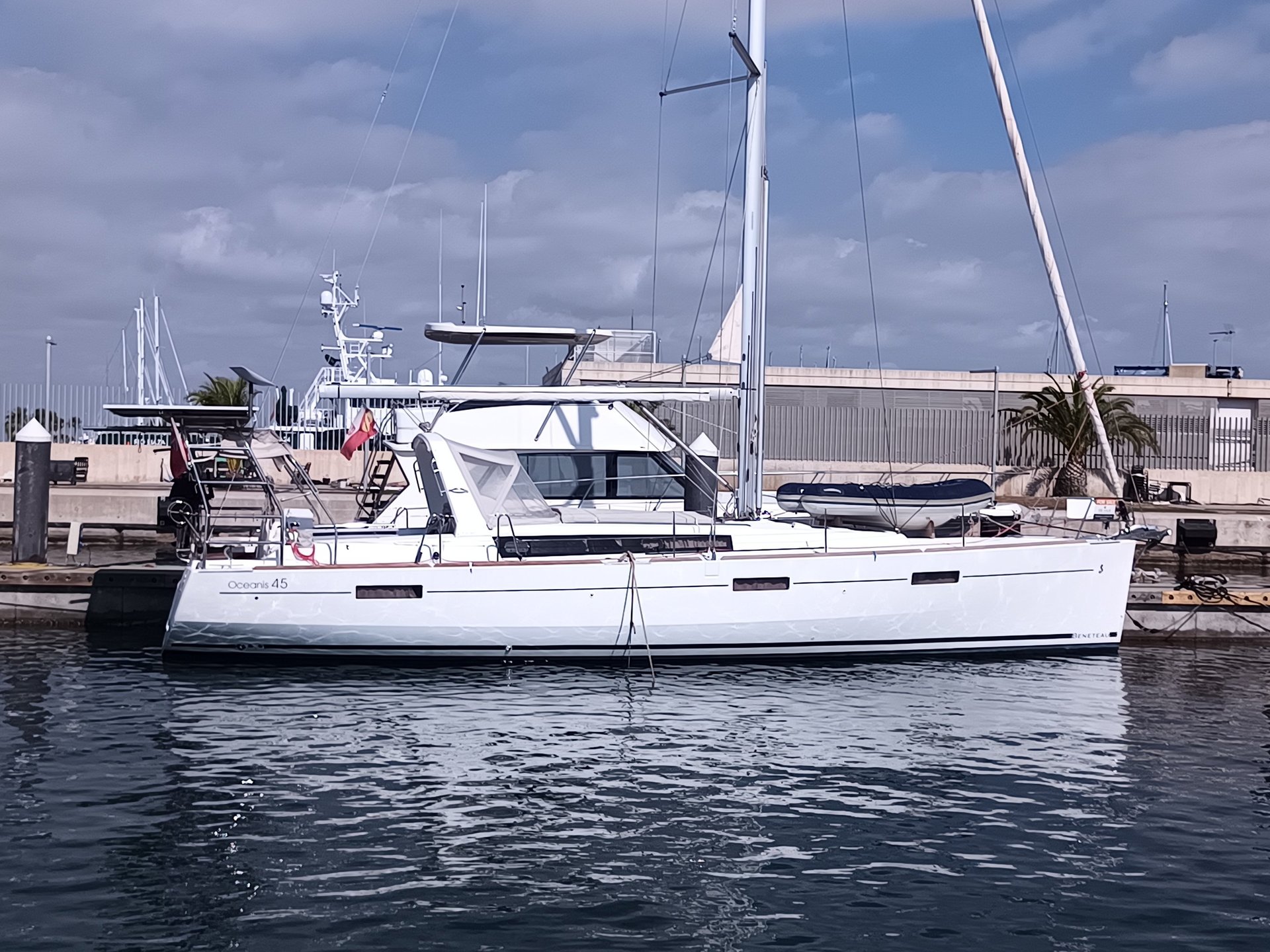 an abstract photo of a curved building with a blue sky in the background
