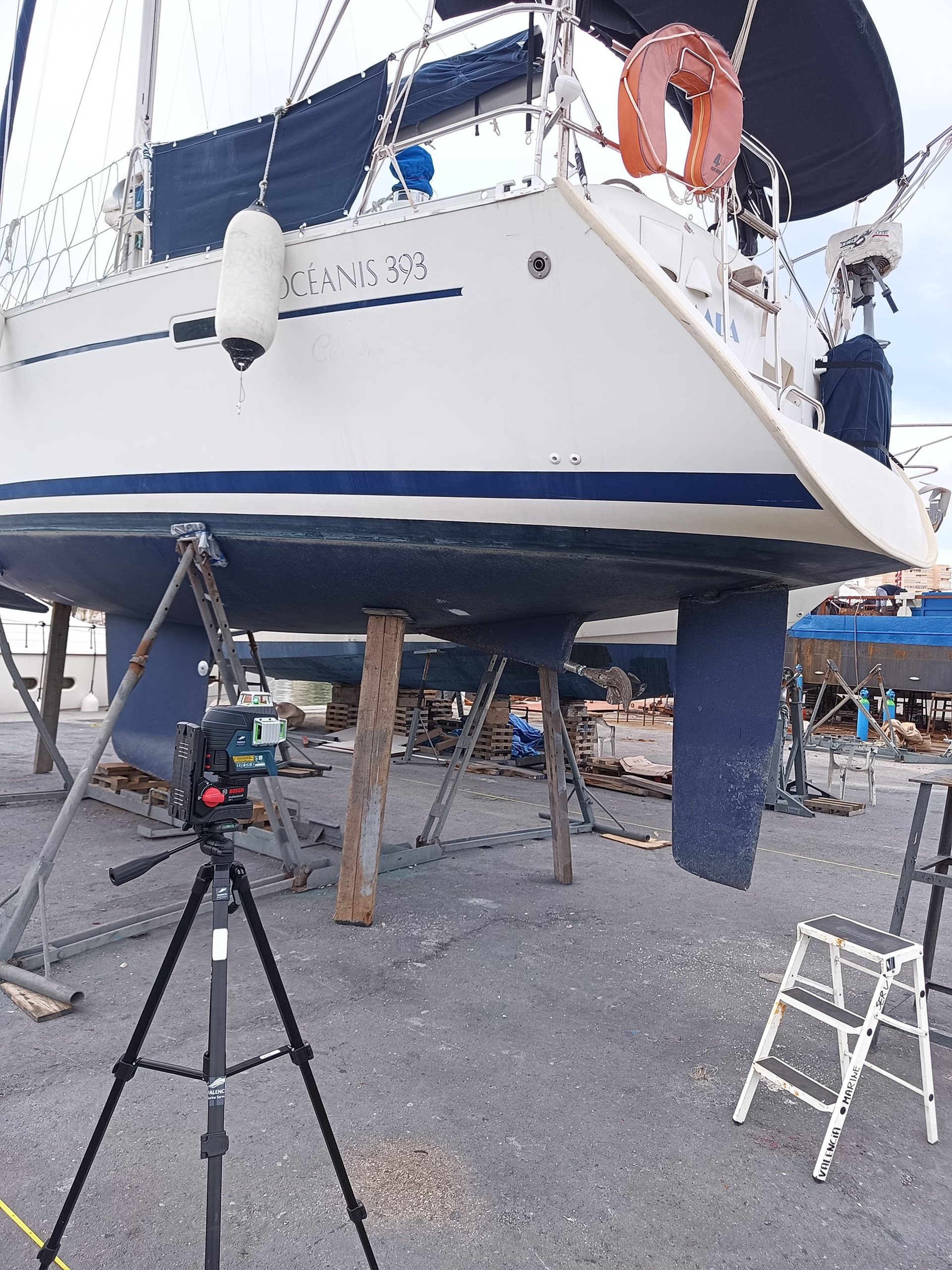 an abstract photo of a curved building with a blue sky in the background