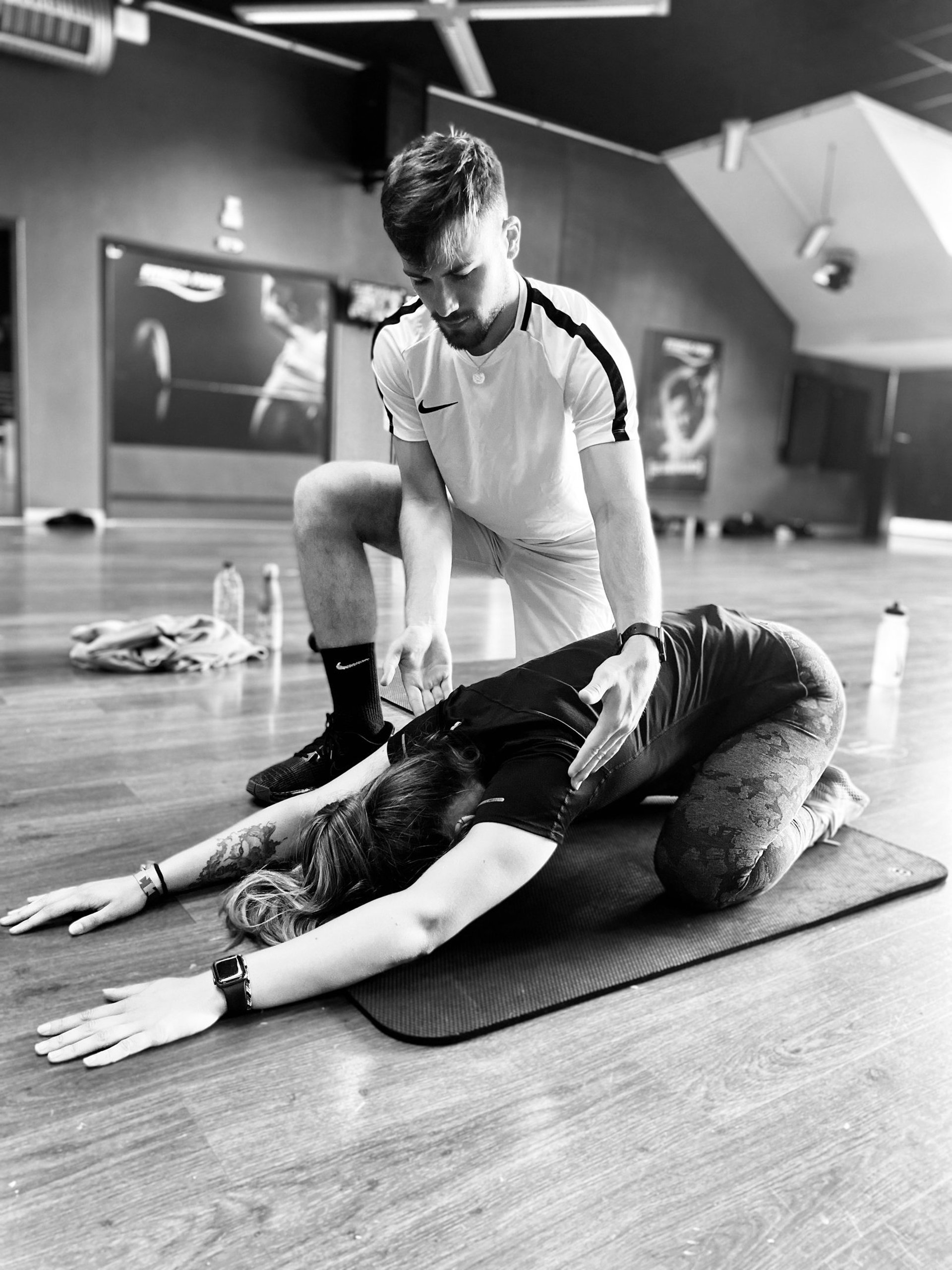 black and brown leather padded tub sofa