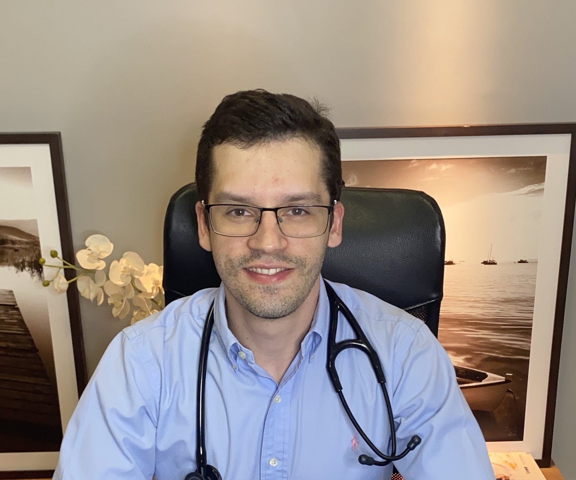 black and brown leather padded tub sofa