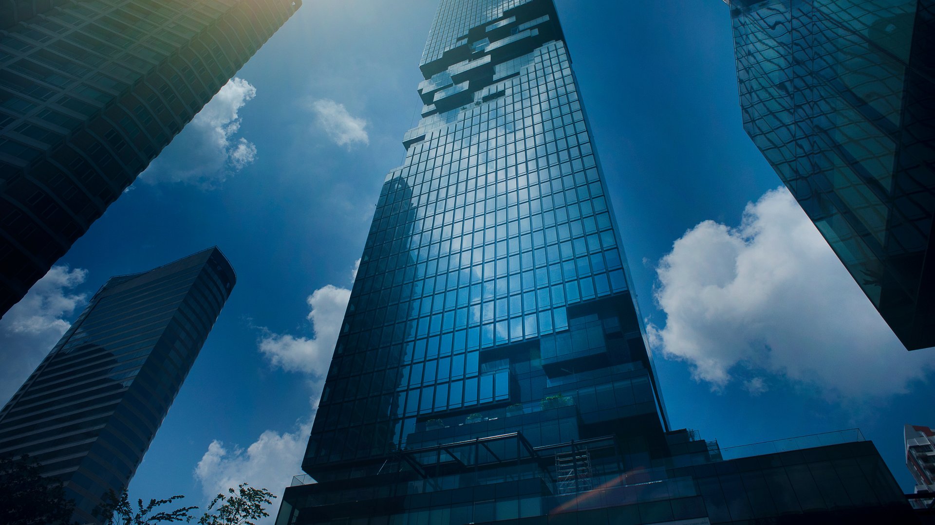 low angle photo of city high rise buildings during daytime