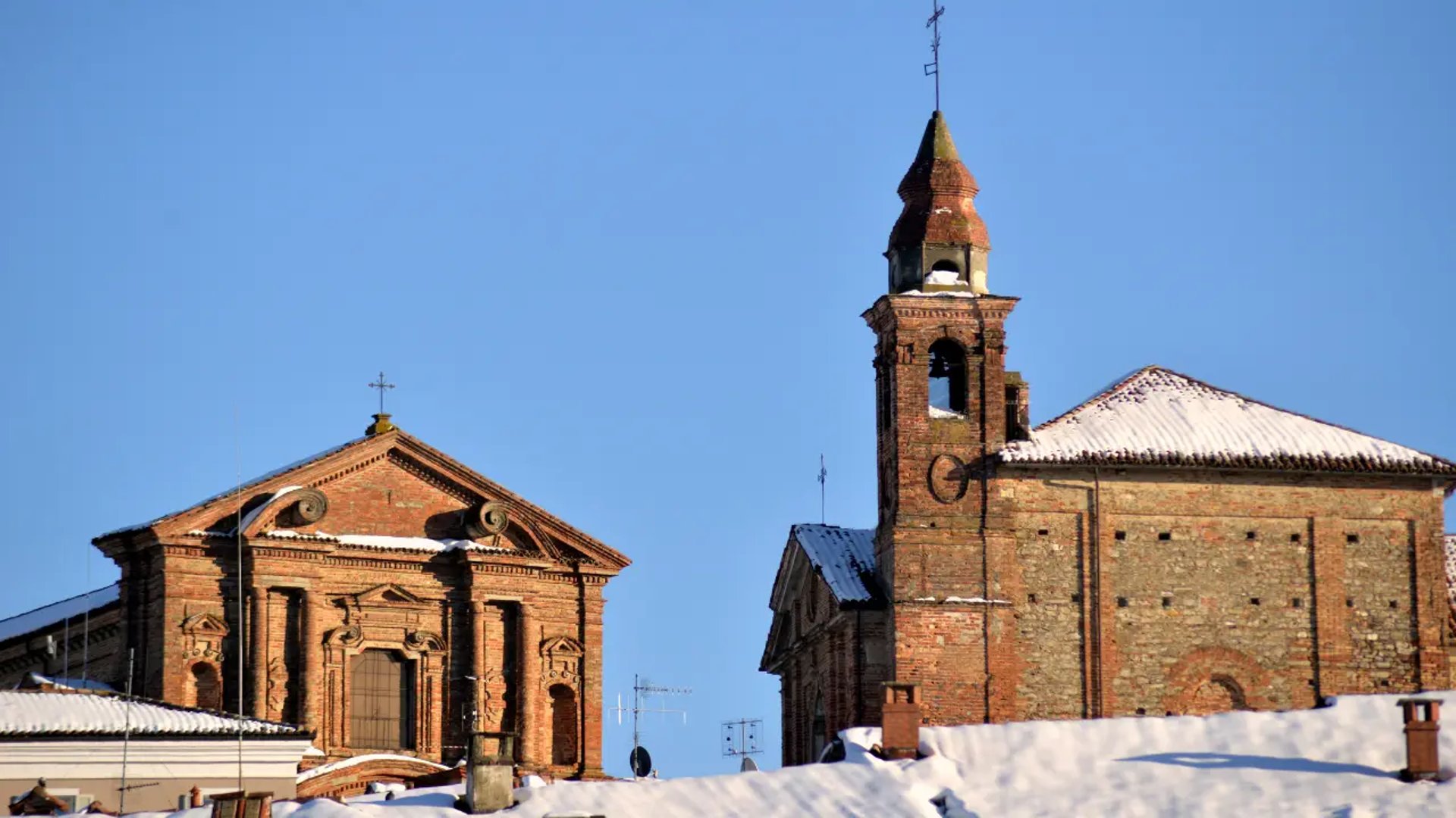 Historic center of La Morra Italy with cobbled streets and old houses