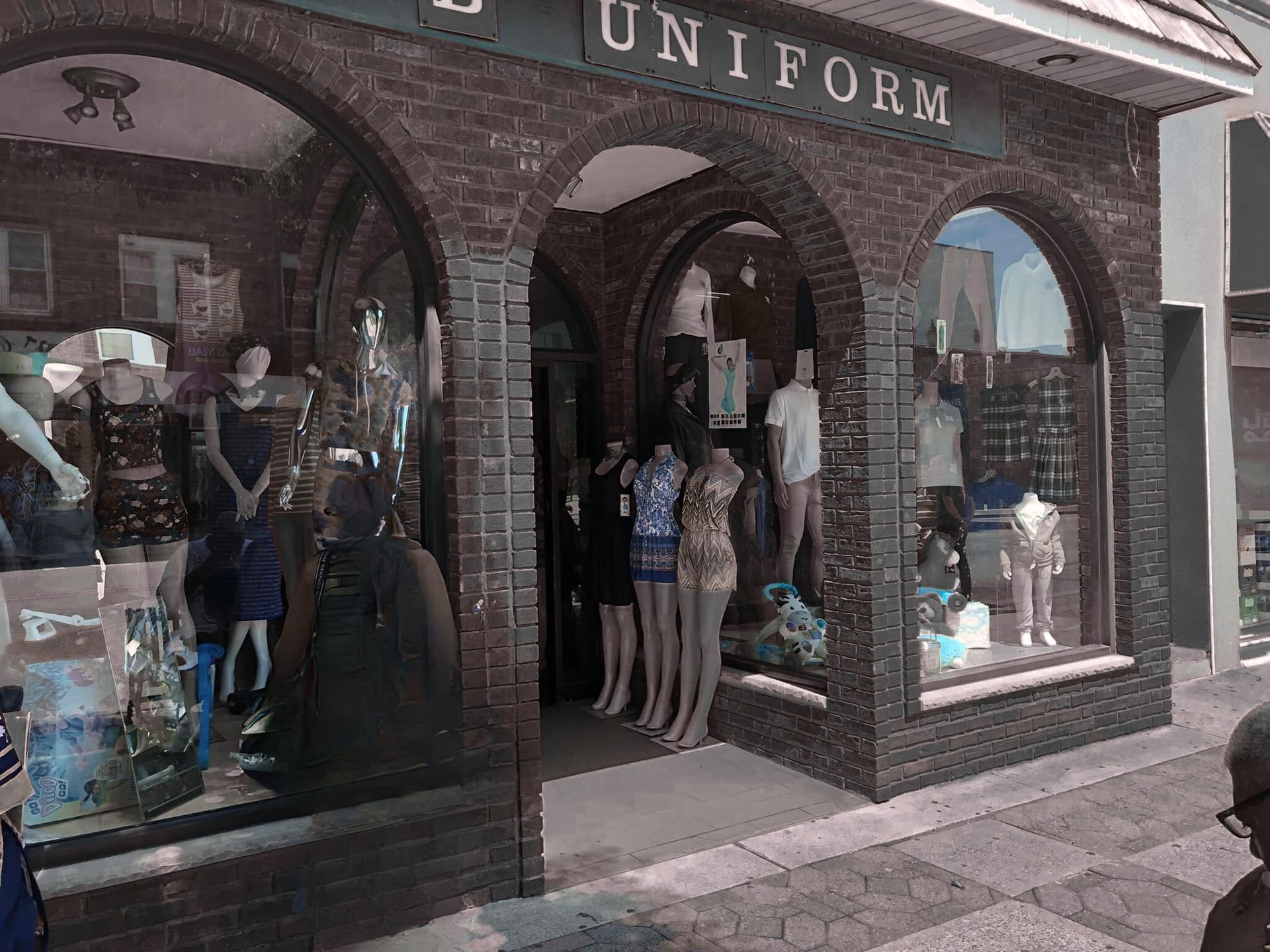 woman wearing yellow long-sleeved dress under white clouds and blue sky during daytime