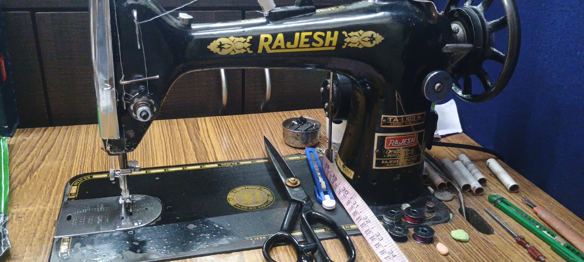 an abstract photo of a curved building with a blue sky in the background