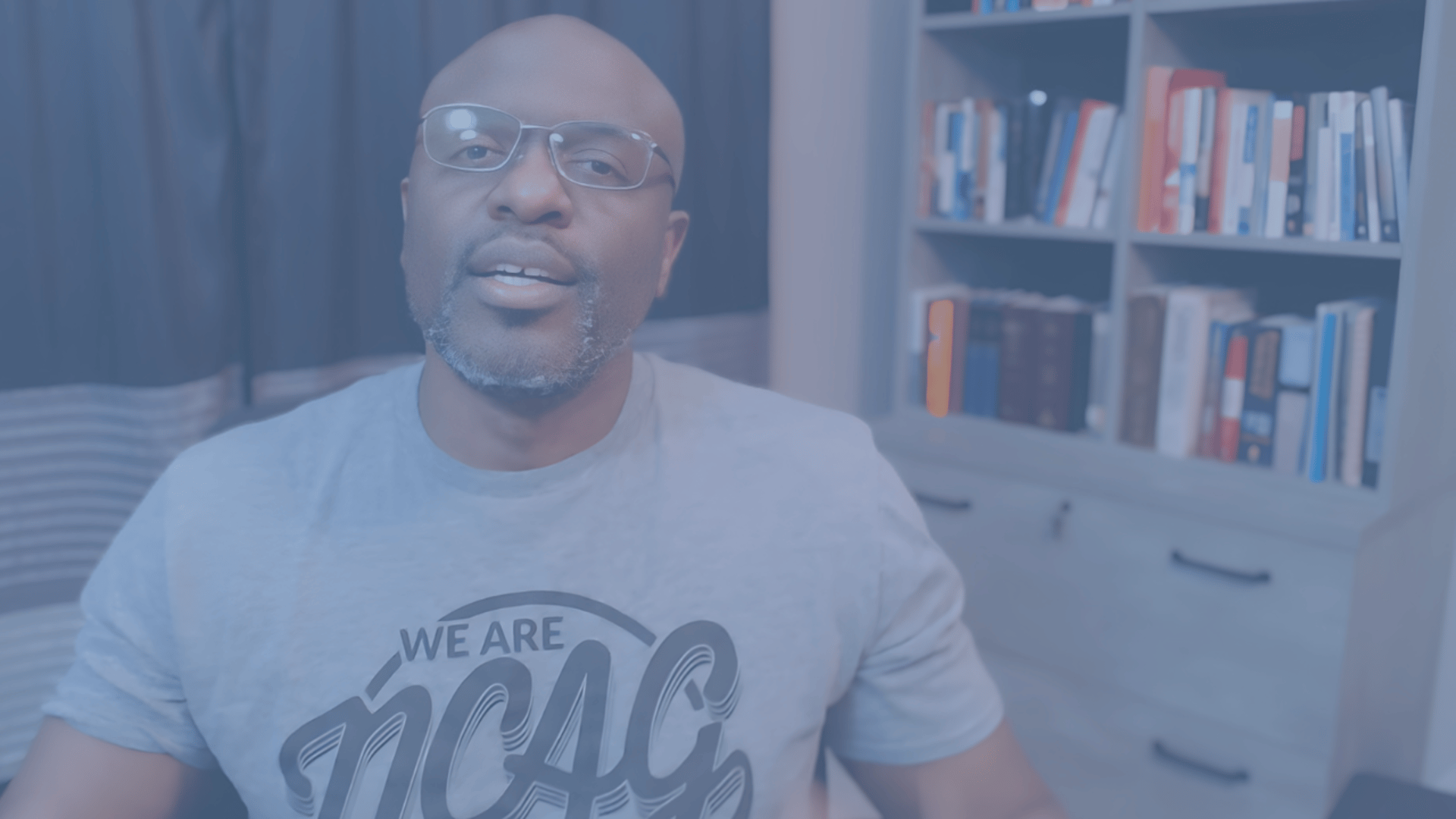 a microphone sitting on top of a desk next to a computer