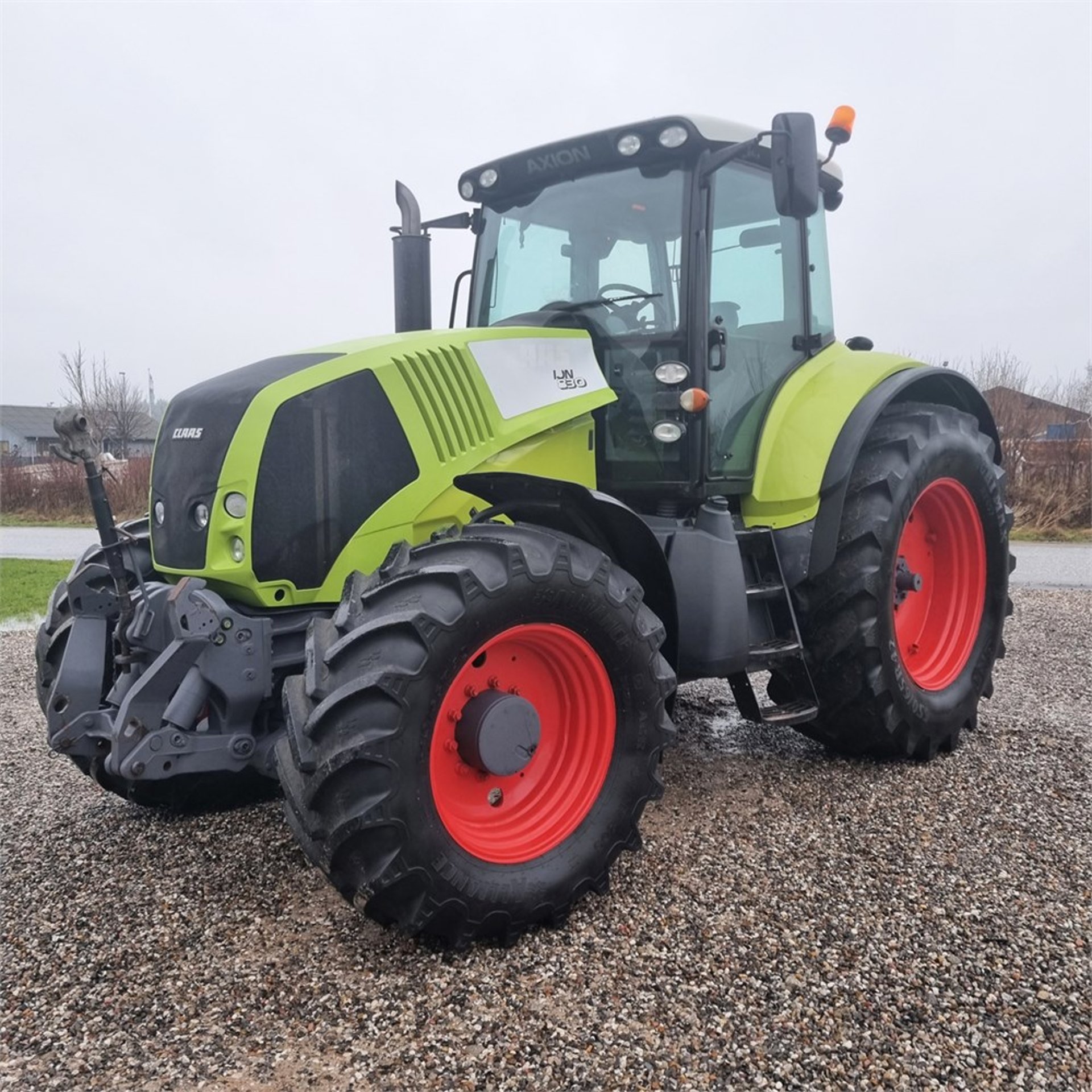 an abstract photo of a curved building with a blue sky in the background