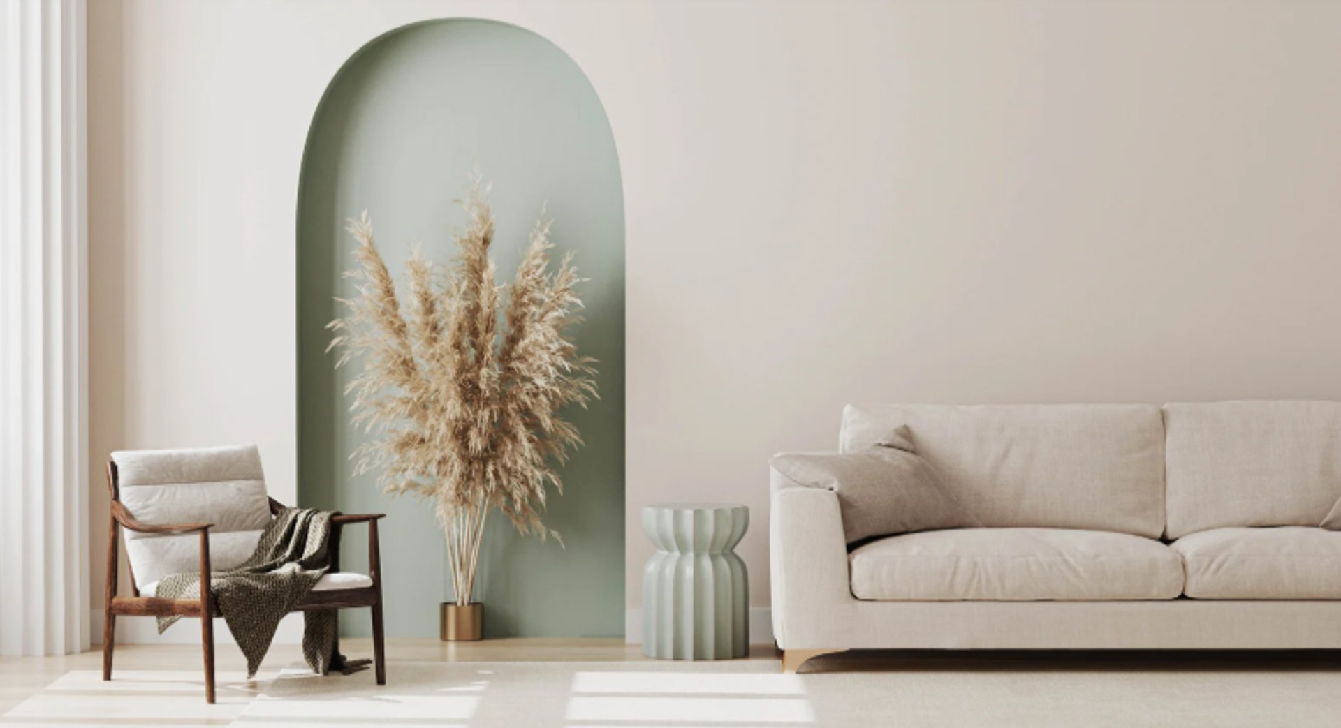 gray padded chaise couch beside window